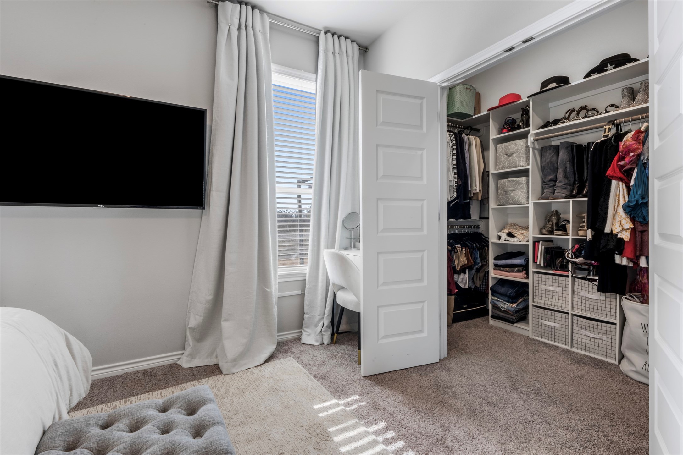 2506 Lightfoot Lane Bryan, TX 77803 - Photo 21 of 47 a view of walk in closet with clothes and shoes