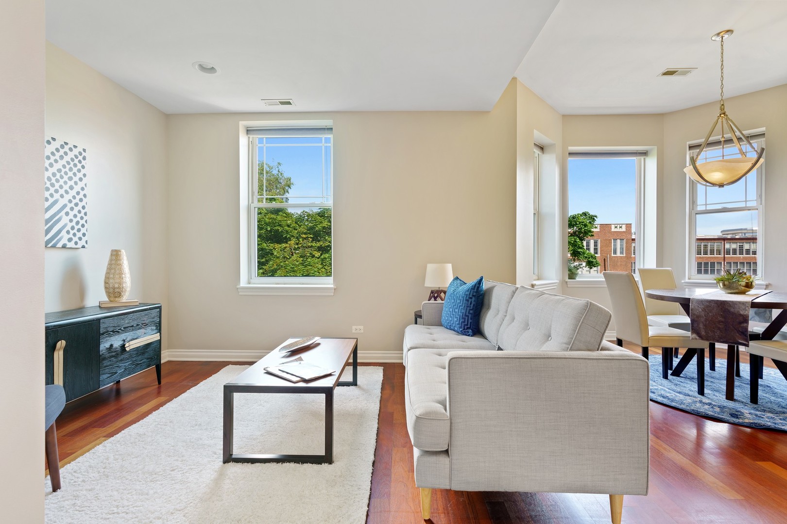 4440 North Dover Street, Unit 3S Chicago, IL 60640 - Photo 2 of 20 a living room with furniture and a window