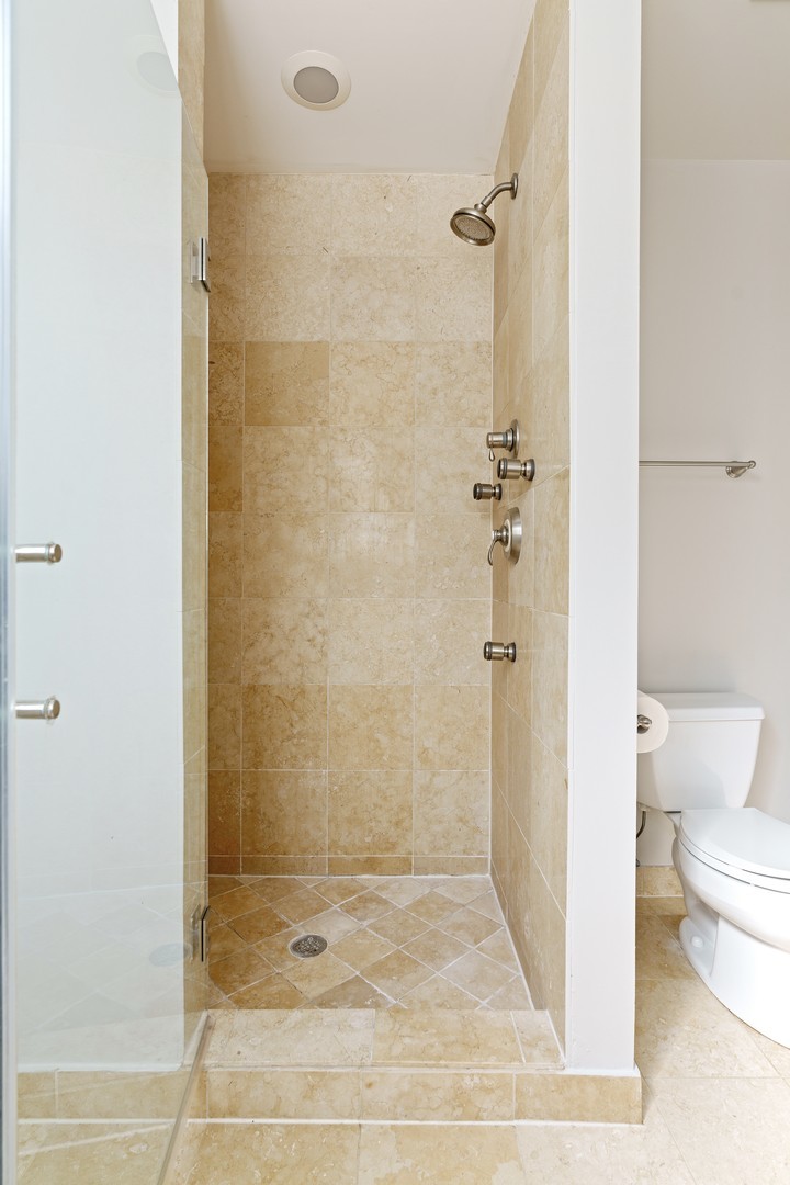 4440 North Dover Street, Unit 3S Chicago, IL 60640 - Photo 14 of 20 a bathroom with a shower