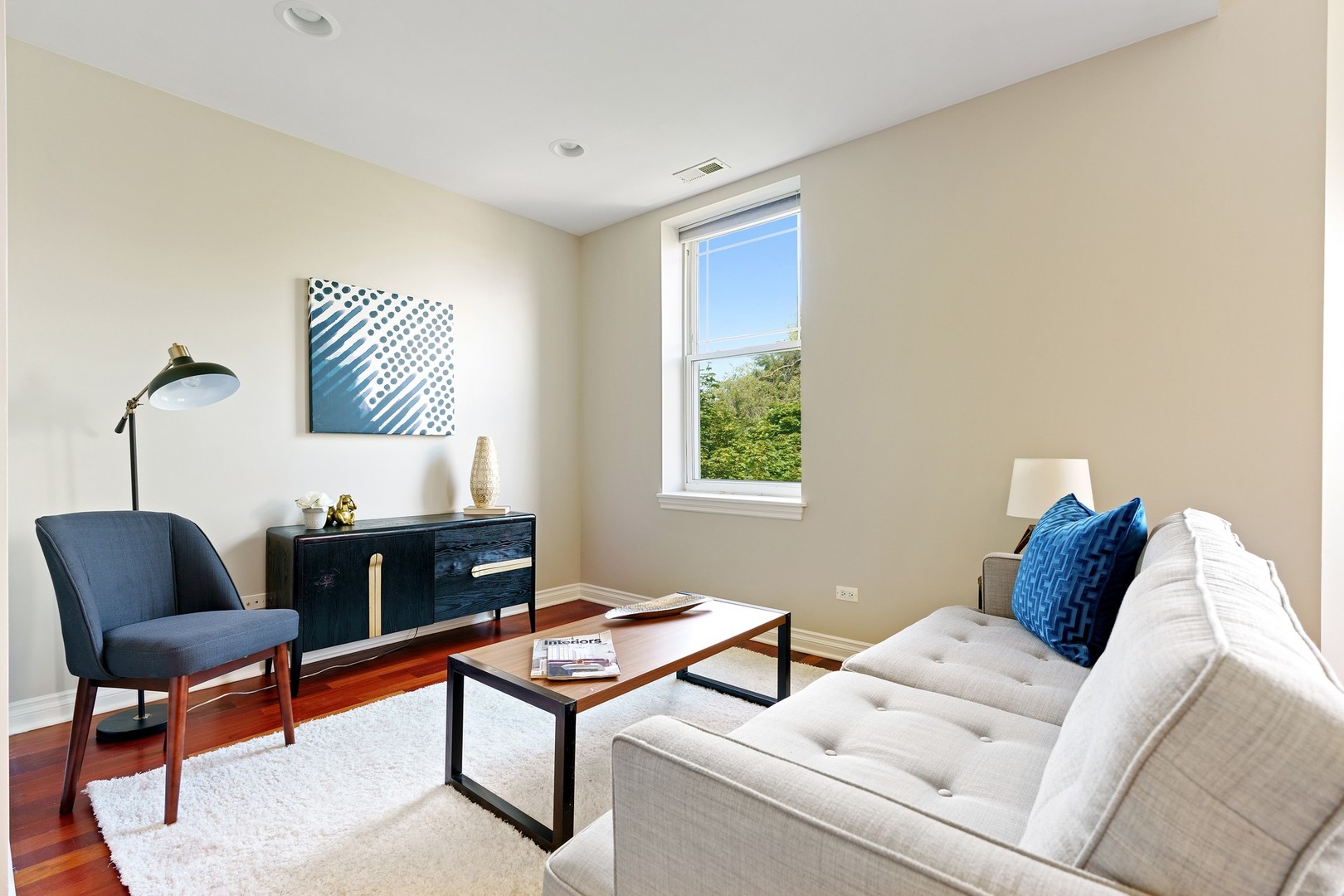 4440 North Dover Street, Unit 3S Chicago, IL 60640 - Photo 3 of 20 a living room with furniture and a window