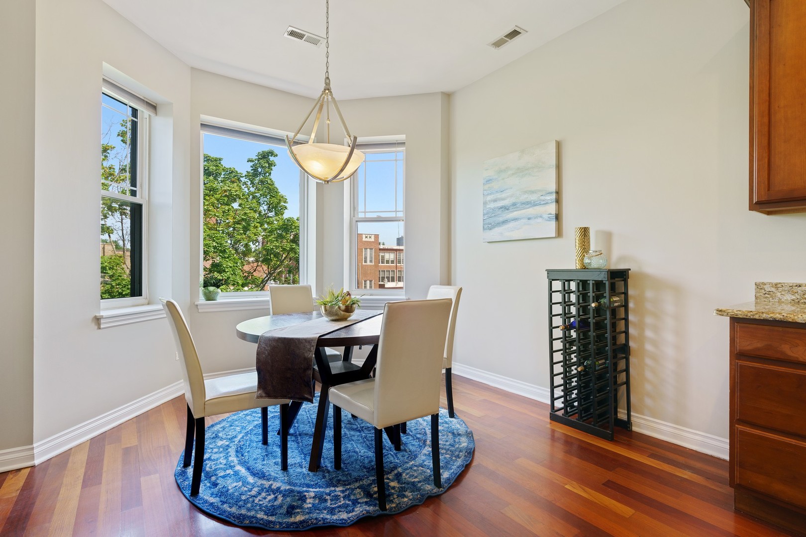 4440 North Dover Street, Unit 3S Chicago, IL 60640 - Photo 8 of 20 a dining room with furniture window wooden floor