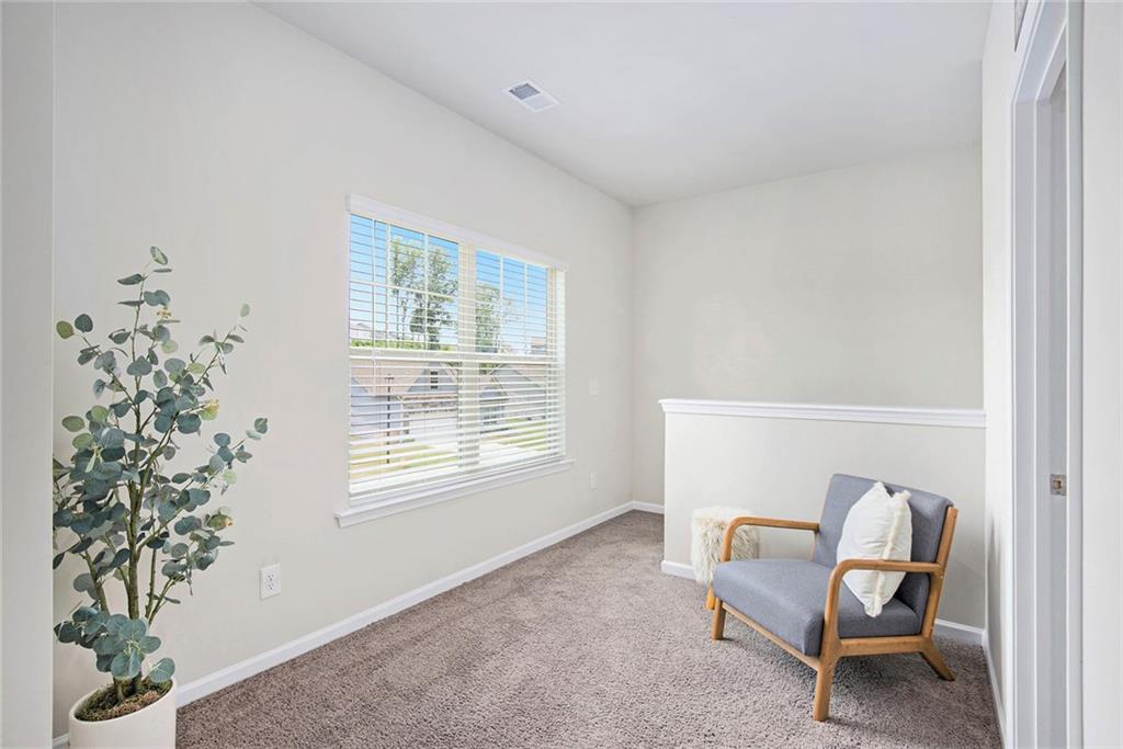 152 Malbone Street Southwest Cartersville, GA 30120 - Photo 15 of 31 a living room with furniture and a window