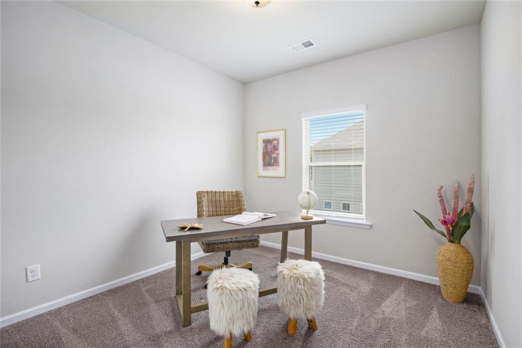 152 Malbone Street Southwest Cartersville, GA 30120 - Photo 22 of 31 a view of a workspace with furniture