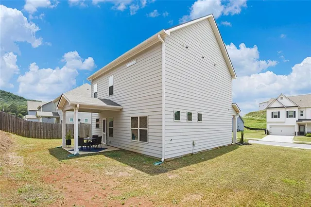 a view of a house with a patio