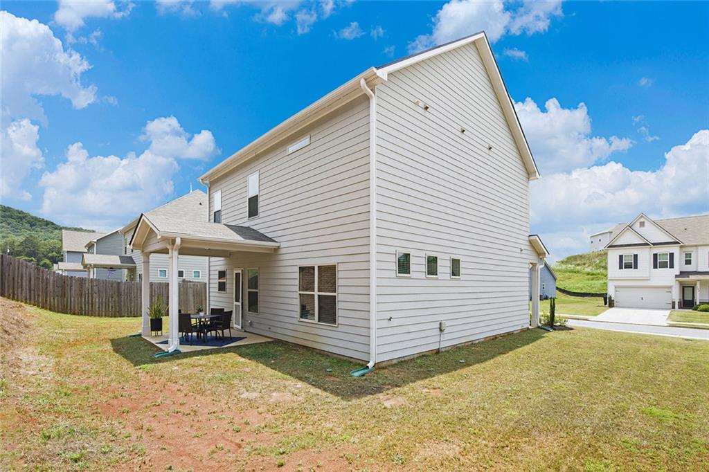 152 Malbone Street Southwest Cartersville, GA 30120 - Photo 27 of 31 a view of a house with a patio