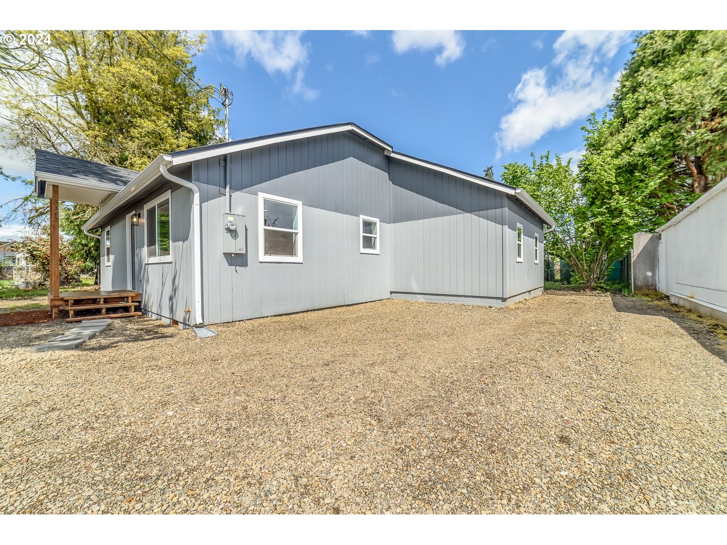 3342 Elliot Lane Springfield, OR 97478 - Photo 3 of 30 a house with trees in the background