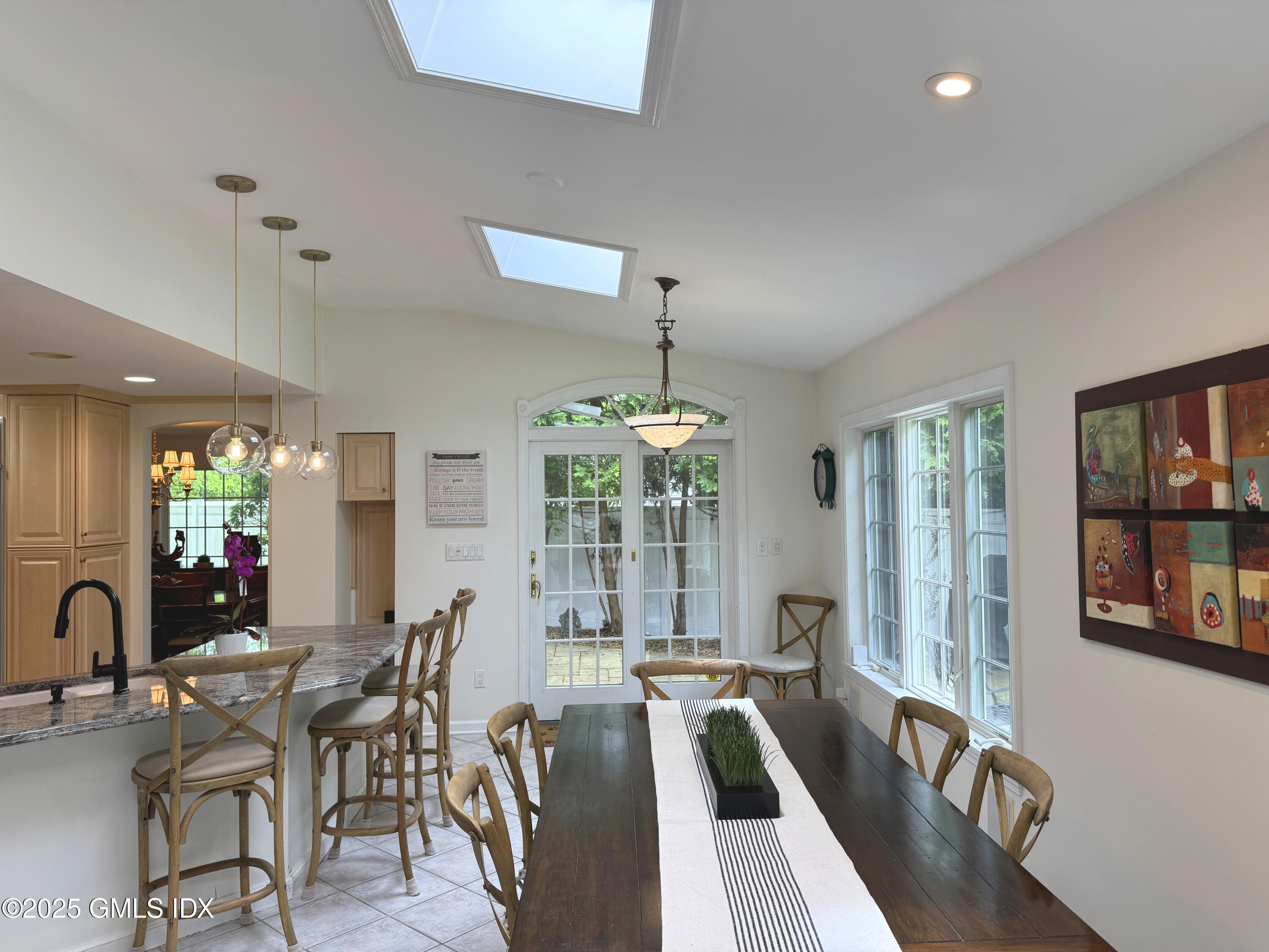 30 Split Timber Place Riverside, CT 06878 - Photo 15 of 49 a view of a dining room with furniture window and wooden floor