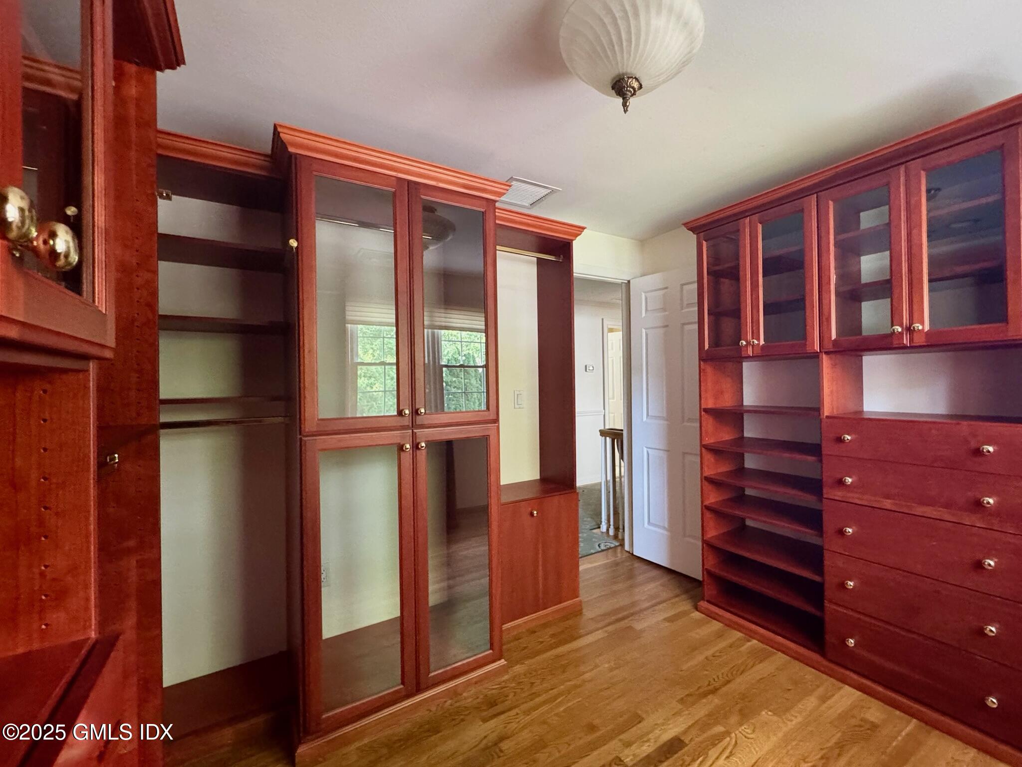 30 Split Timber Place Riverside, CT 06878 - Photo 41 of 49 a view of walk in closet with empty racks