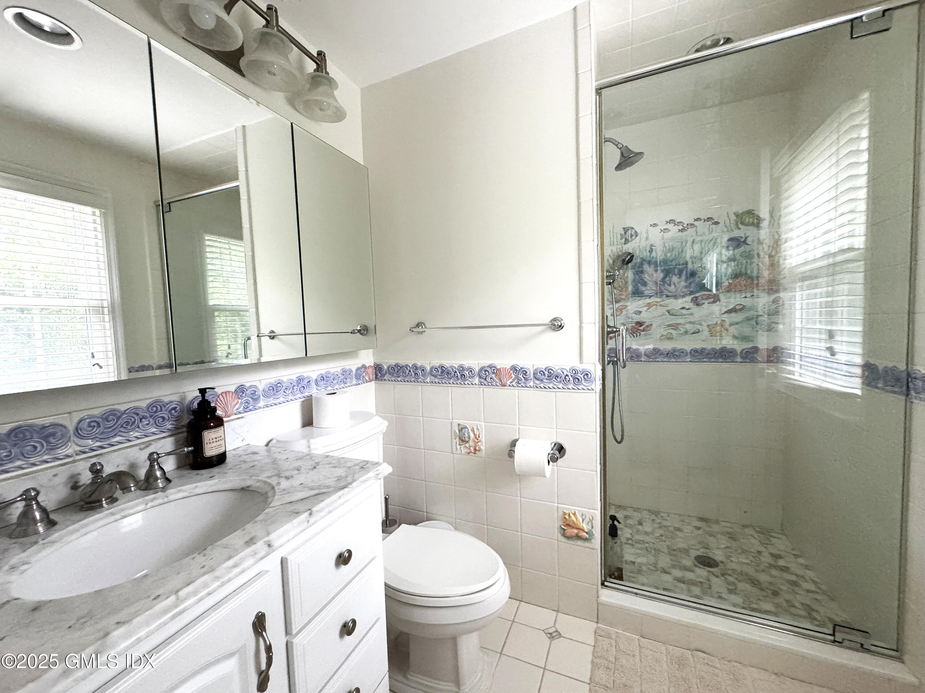 30 Split Timber Place Riverside, CT 06878 - Photo 47 of 49 a bathroom with a granite countertop sink mirror vanity and toilet