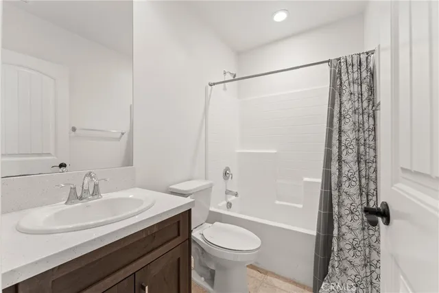 a view of a patio with table and chairs with wooden floor