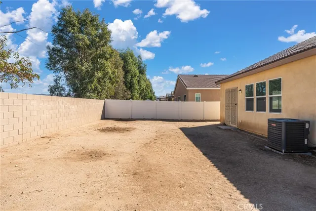 a view of balcony with wooden floor