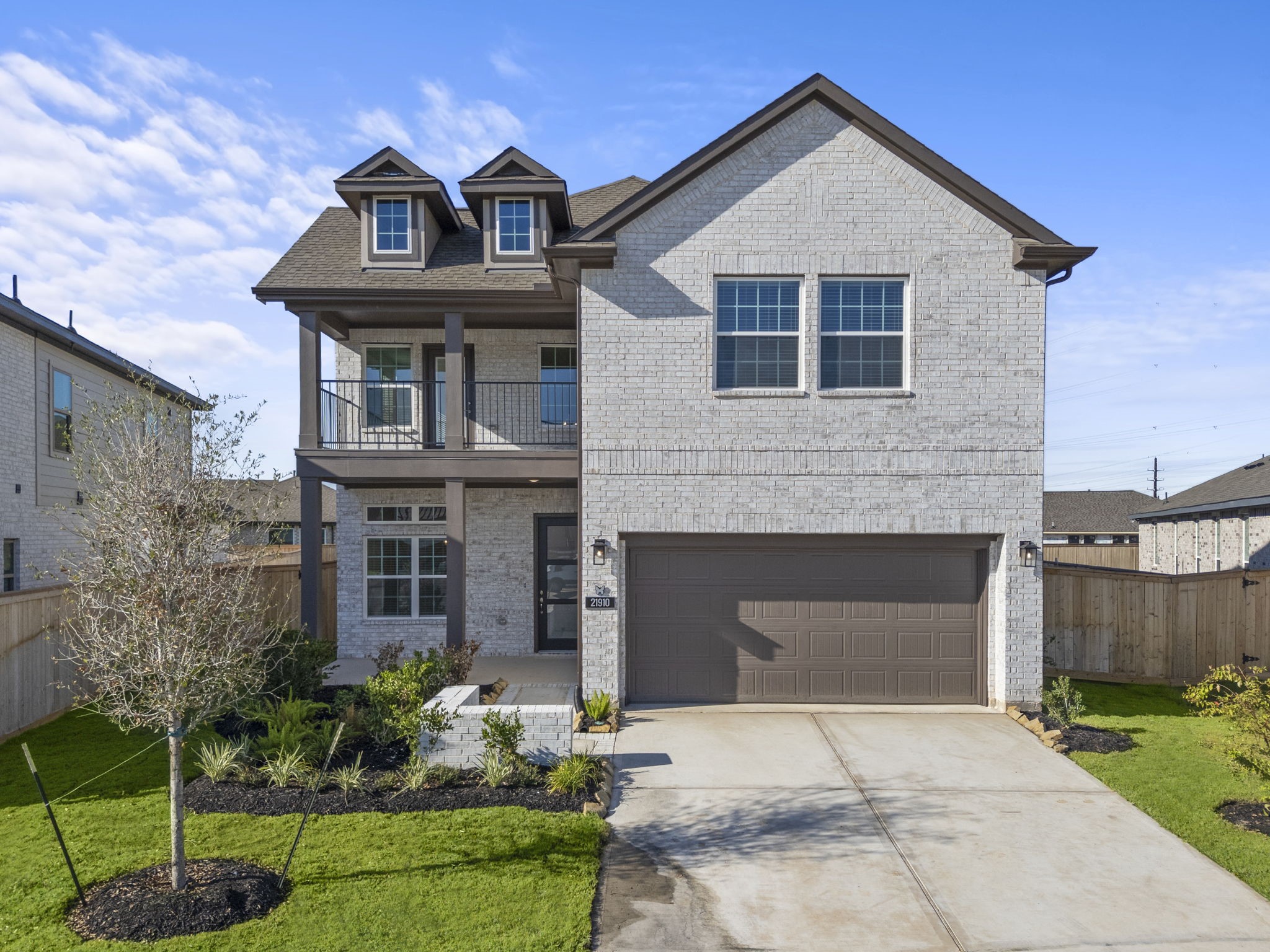 22618 Basswood Bnd Road Waller, TX 77484 - Photo 1 of 36 a front view of a house with a yard and garage