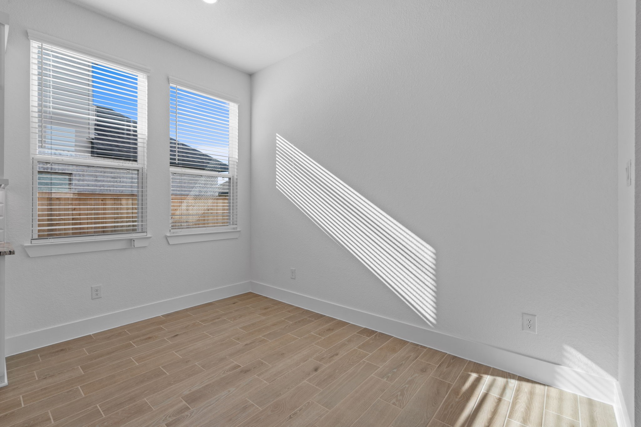 22618 Basswood Bnd Road Waller, TX 77484 - Photo 15 of 36 an empty room with windows