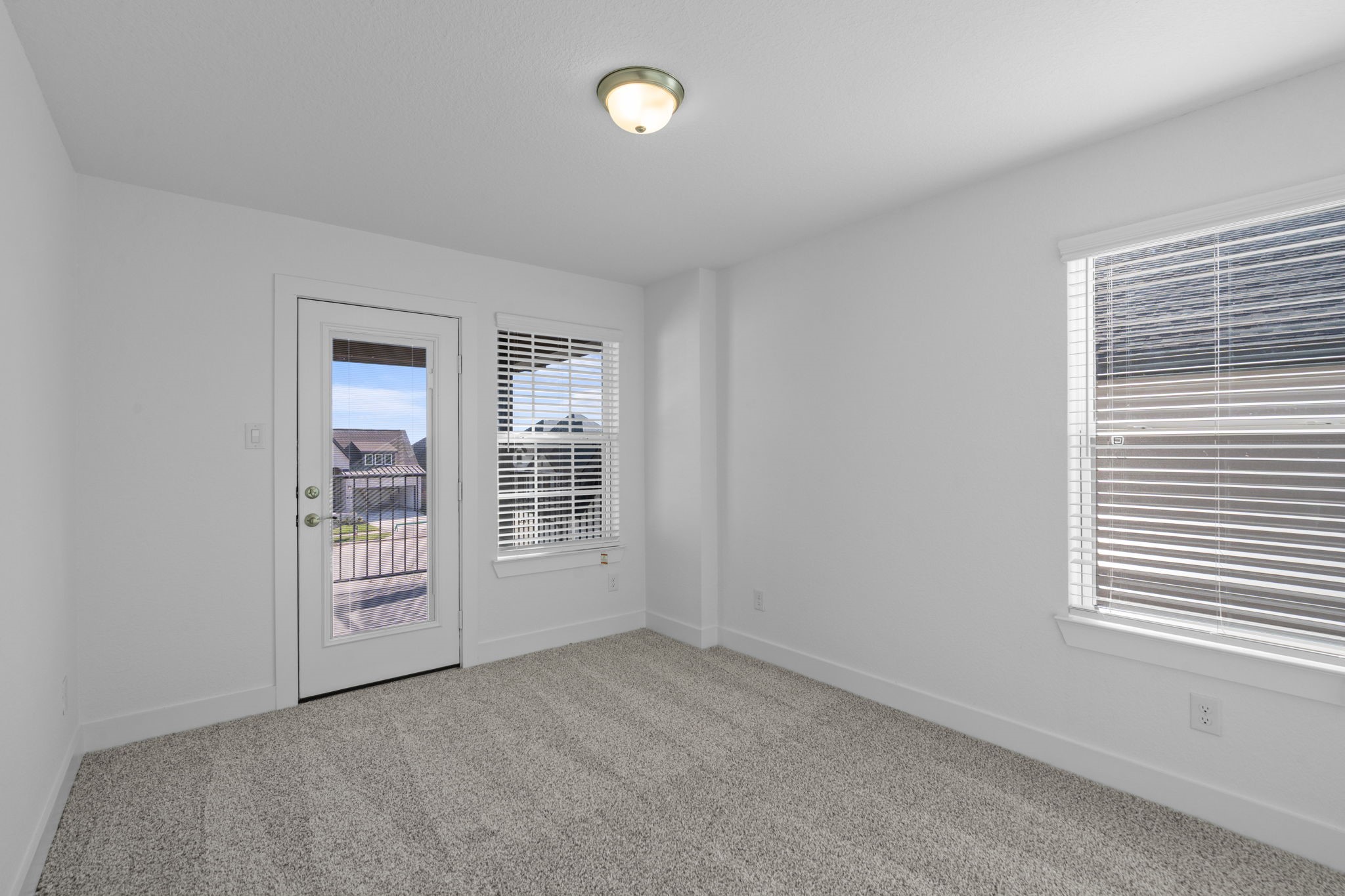 22618 Basswood Bnd Road Waller, TX 77484 - Photo 19 of 36 an empty room with windows
