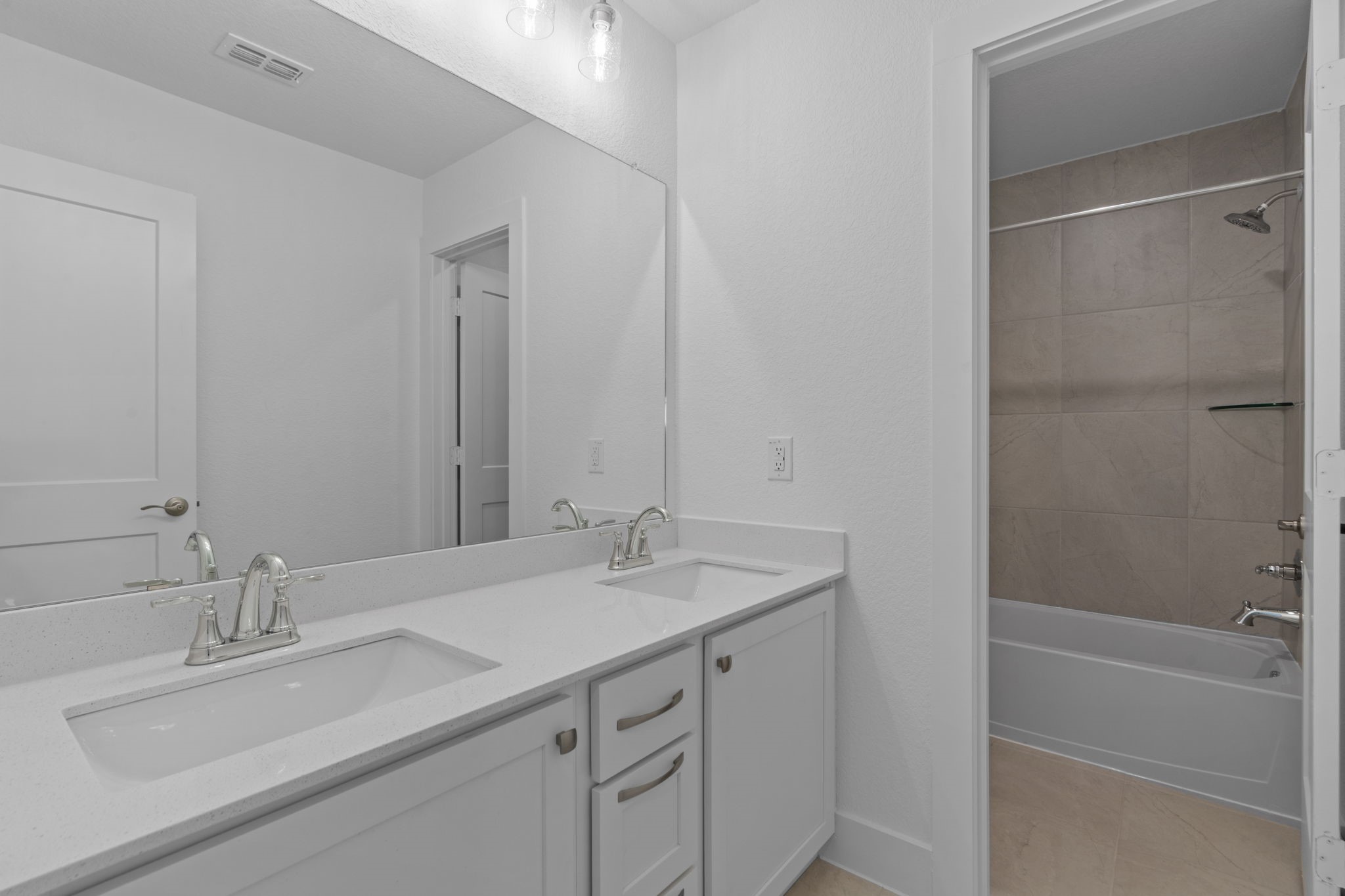 22618 Basswood Bnd Road Waller, TX 77484 - Photo 21 of 36 a bathroom with a sink and a mirror