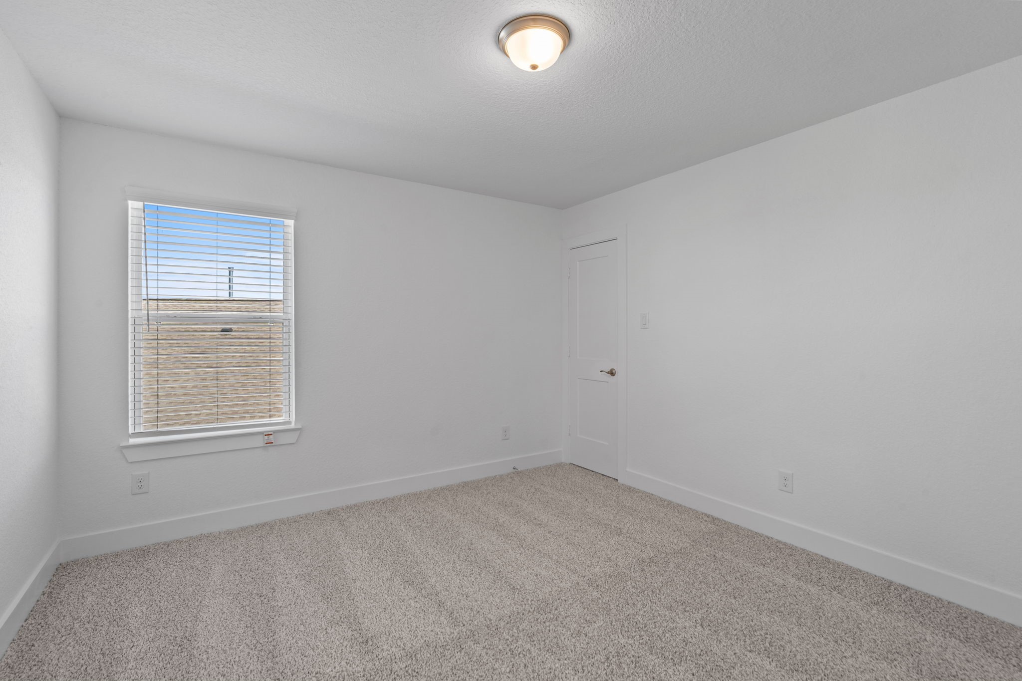 22618 Basswood Bnd Road Waller, TX 77484 - Photo 22 of 36 an empty room with a window