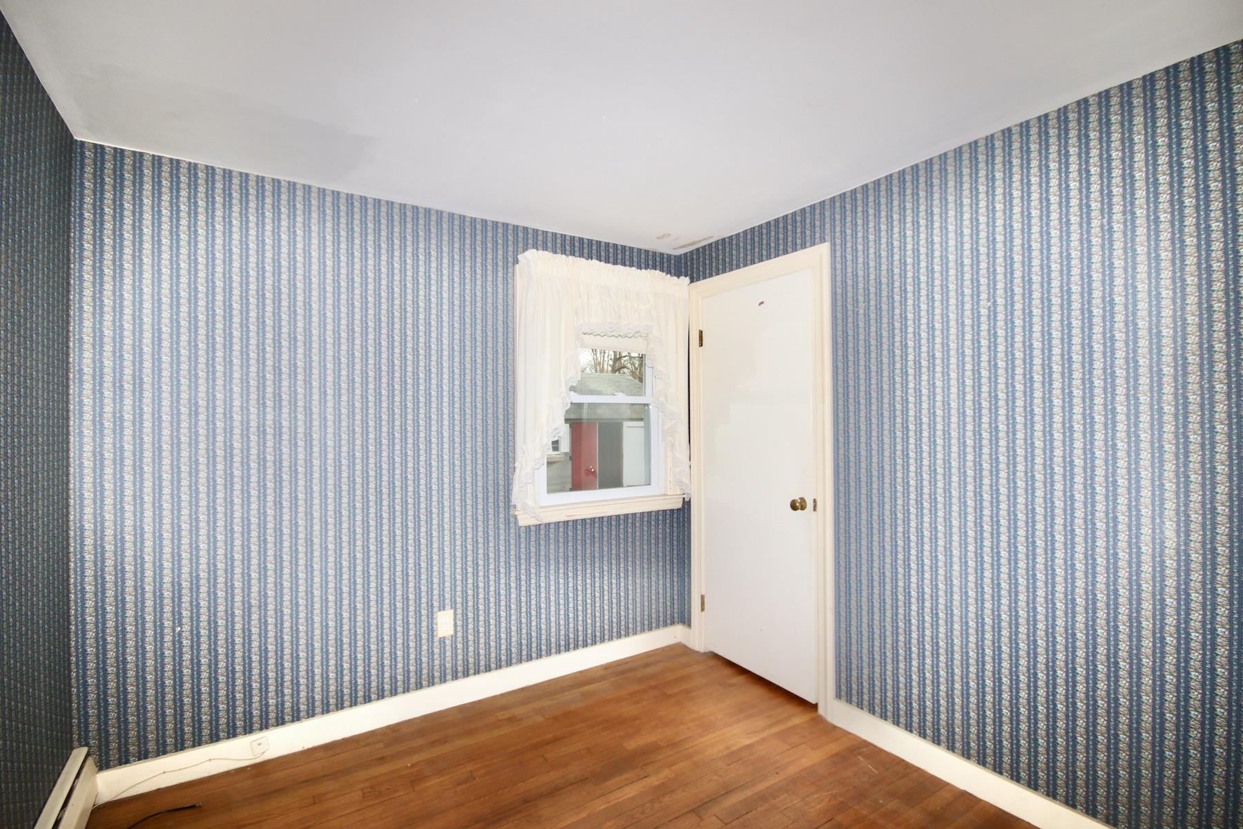 46 Fisher Road Hyannis, MA 02601 - Photo 17 of 29 a view of an empty room with wooden floor