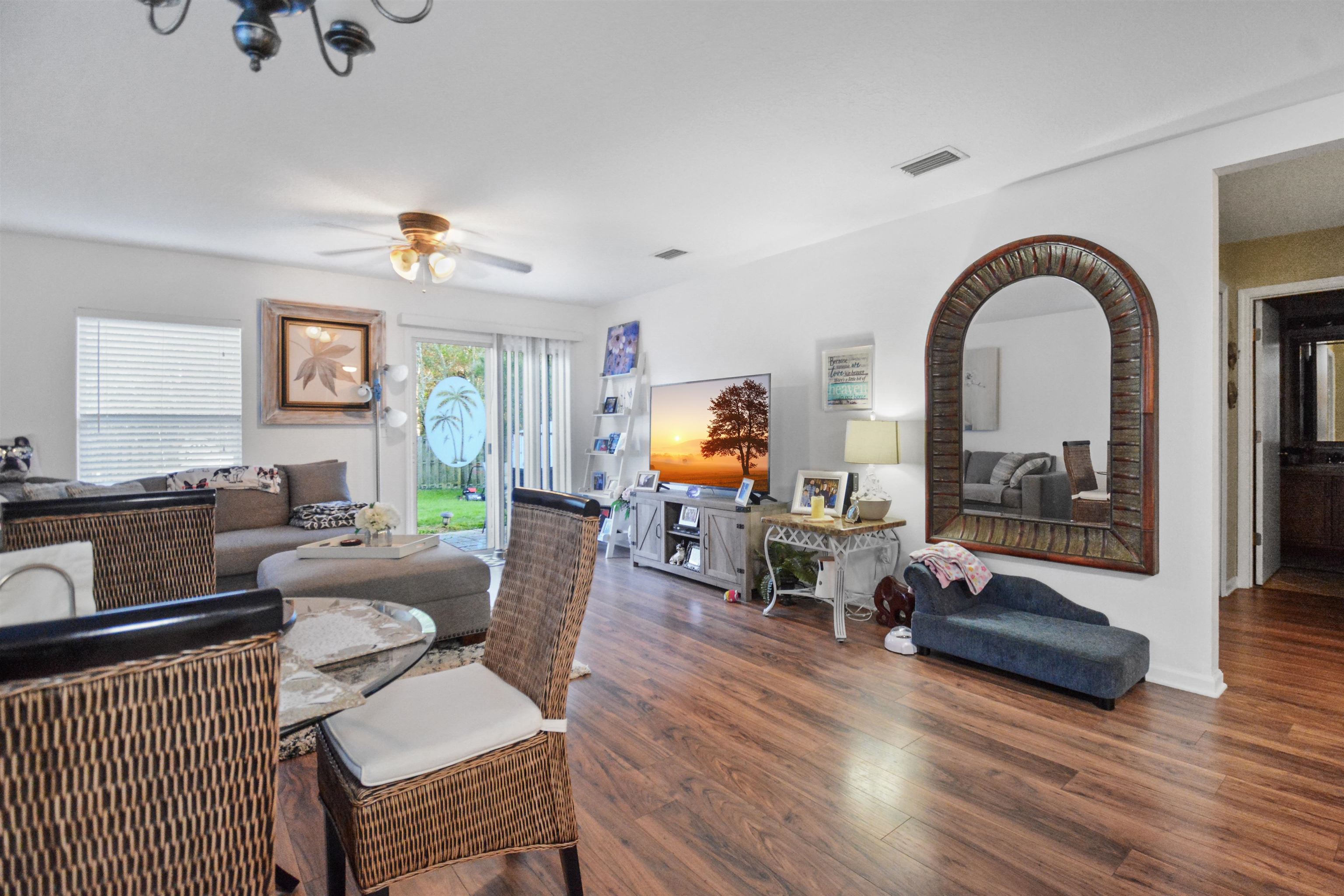 279 Buck Run Way St. Augustine, FL 32092 - Photo 6 of 28 a living room with furniture and a large window