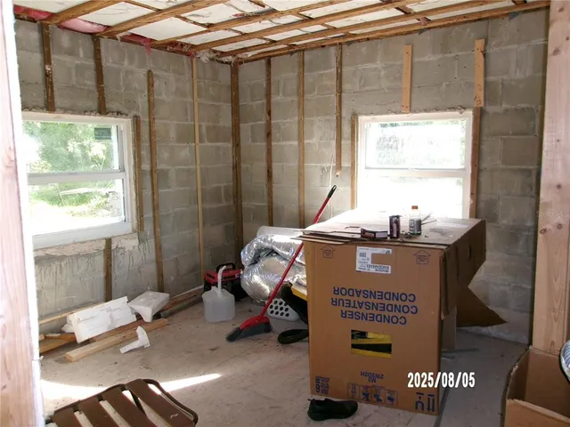 a room with furniture and a window