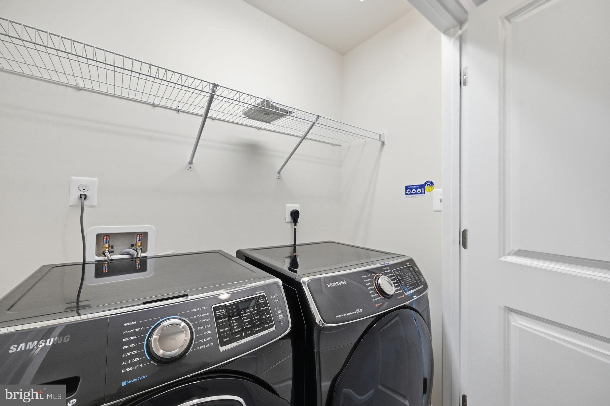 650 Aspen Road, Unit 108 Stafford, VA 22554 - Photo 18 of 26 Modern laundry space with sleek appliances.