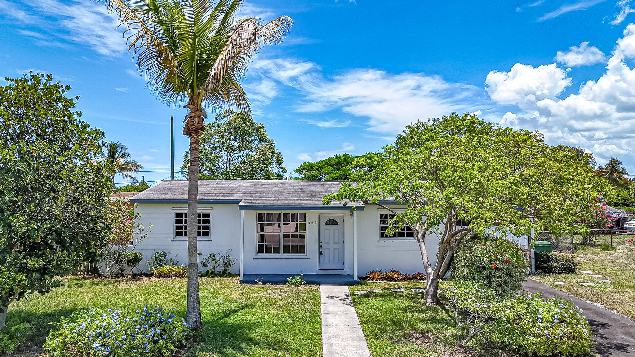 337 Mid Pines Road Palm Springs, FL 33461 - Photo 2 of 32 dji_fly_20260619_131334_0008_17819623150