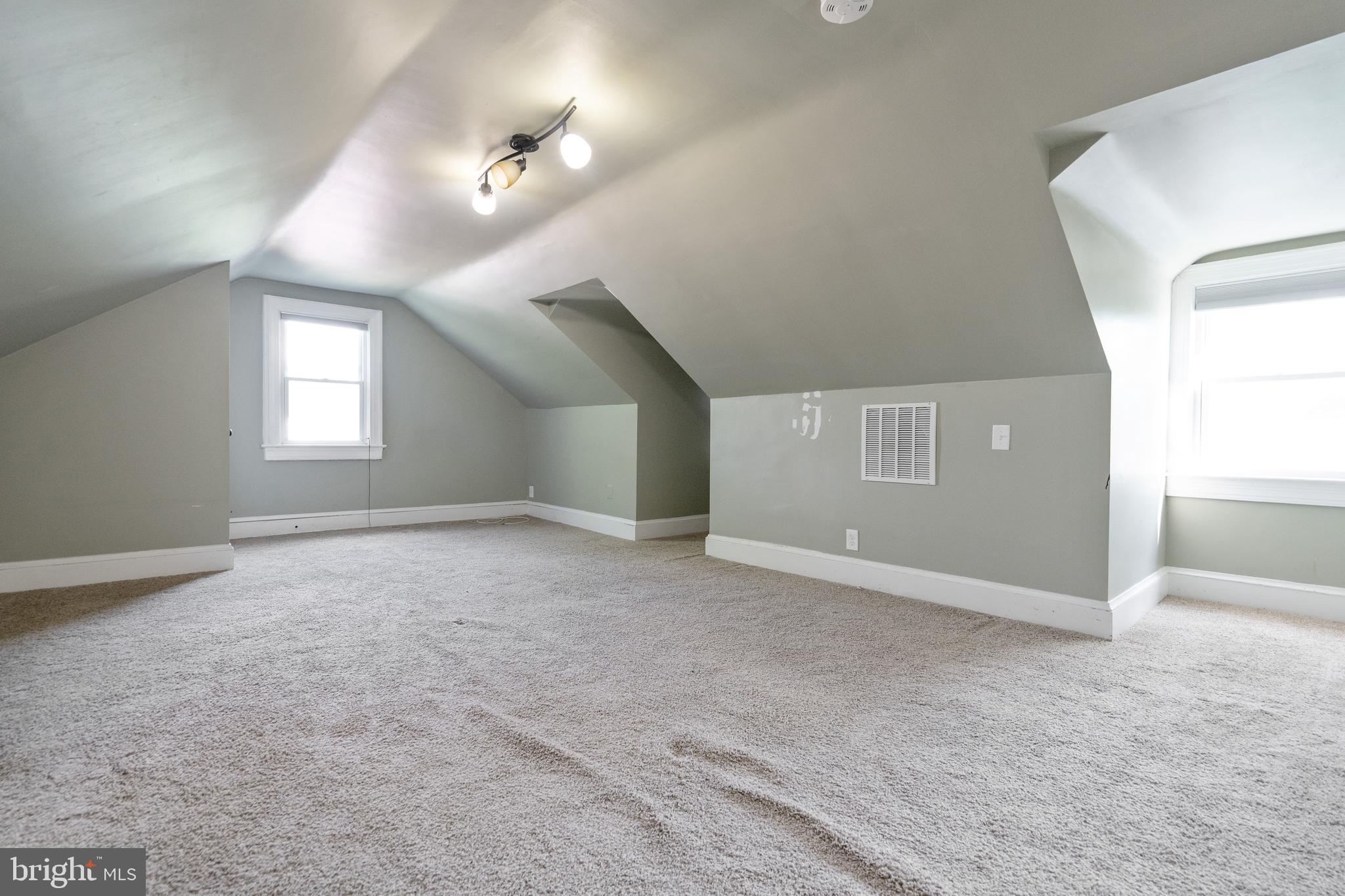 1955 Seminary Road Silver Spring, MD 20910 - Photo 27 of 41 an empty room with windows and entrance