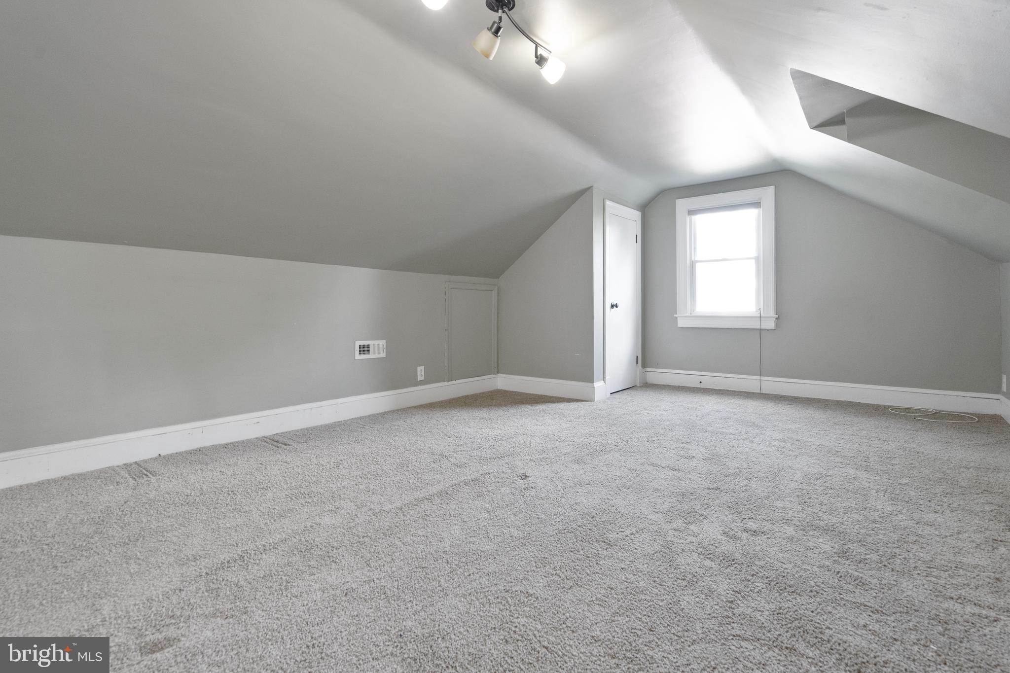 1955 Seminary Road Silver Spring, MD 20910 - Photo 29 of 41 a view of an empty room with a window