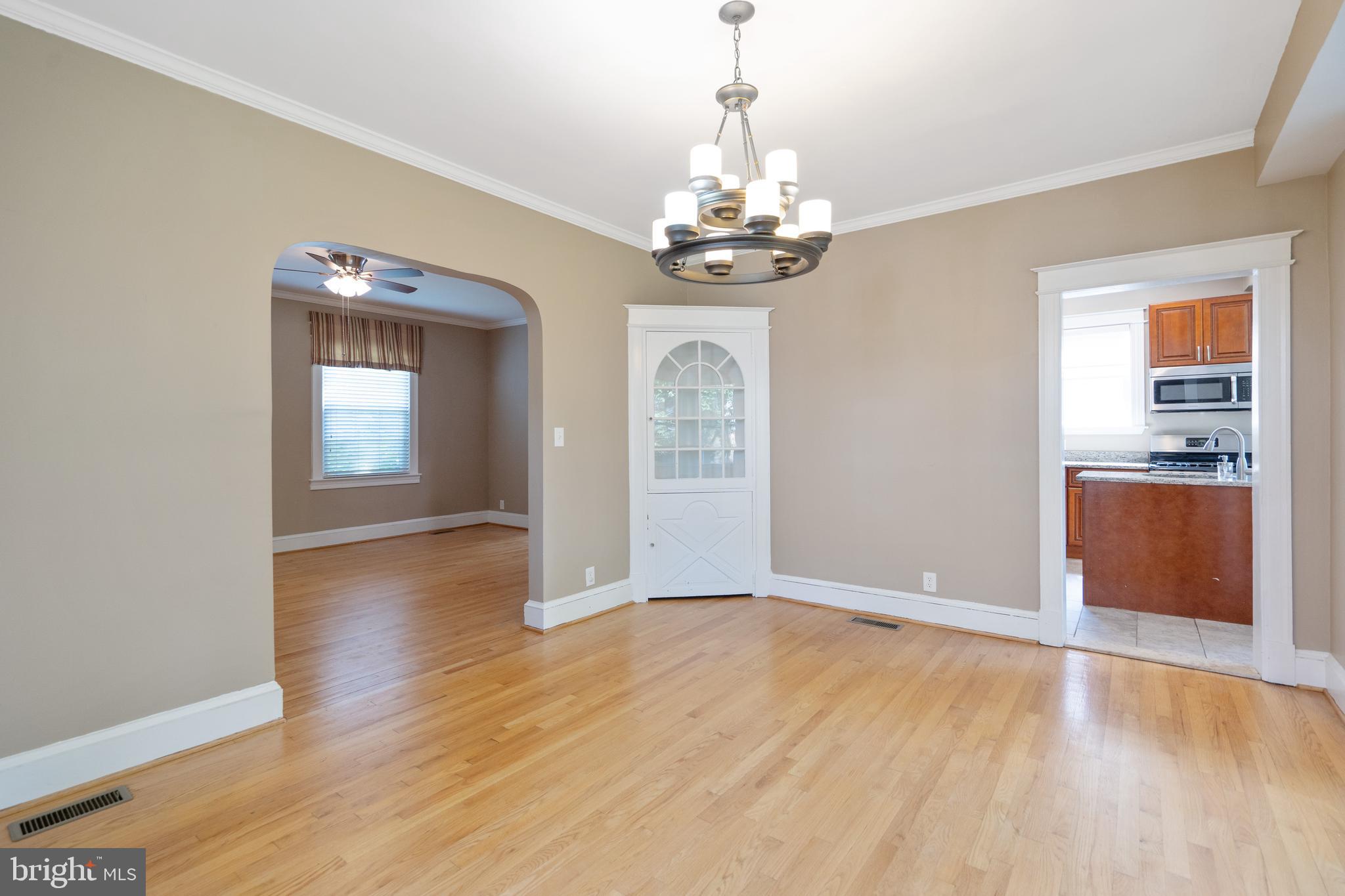 1955 Seminary Road Silver Spring, MD 20910 - Photo 8 of 41 a view of livingroom with kitchen and hardwood