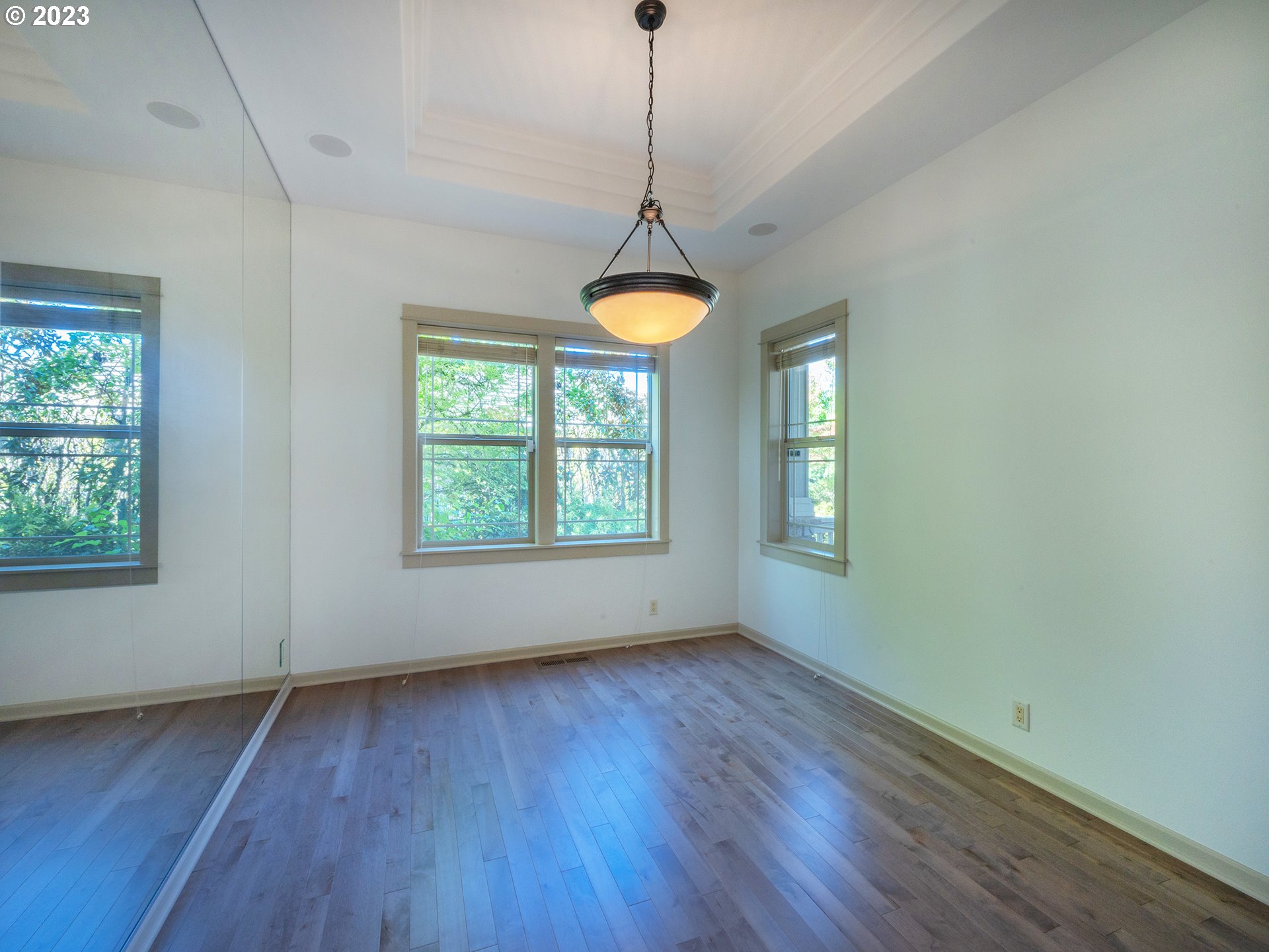 3384 Lakeside Drive Eugene, OR 97401 - Photo 16 of 48 a room with window and wooden floor