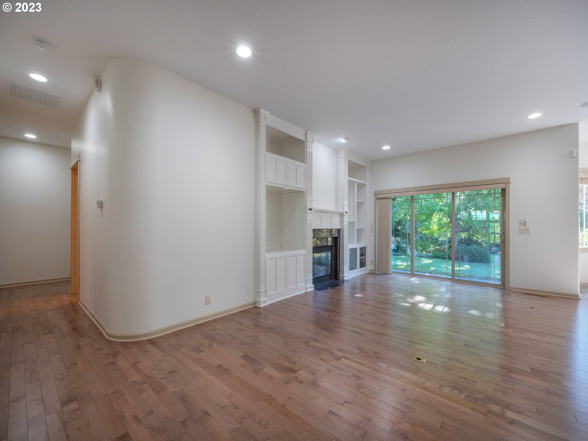 3384 Lakeside Drive Eugene, OR 97401 - Photo 47 of 48 an empty room with wooden floor and outdoor kitchen