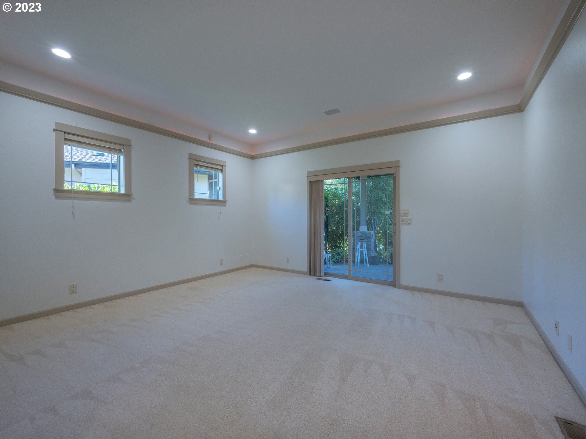 3384 Lakeside Drive Eugene, OR 97401 - Photo 26 of 48 a view of a big room with windows and chandelier fan