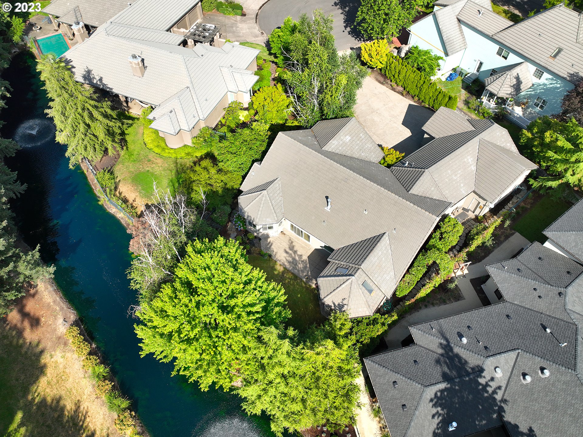 3384 Lakeside Drive Eugene, OR 97401 - Photo 4 of 48 an aerial view of a house with a yard and a wooden deck