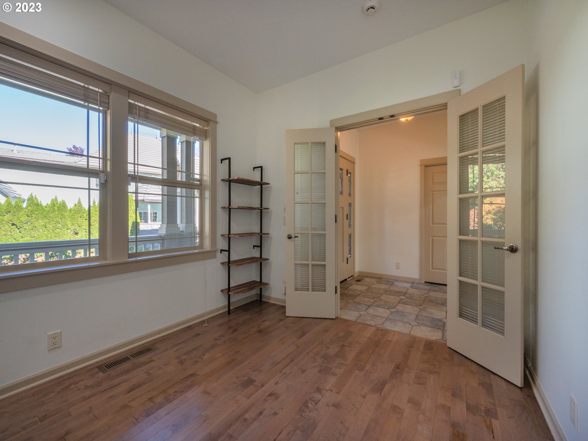 3384 Lakeside Drive Eugene, OR 97401 - Photo 37 of 48 a view of empty room with wooden floor and fan
