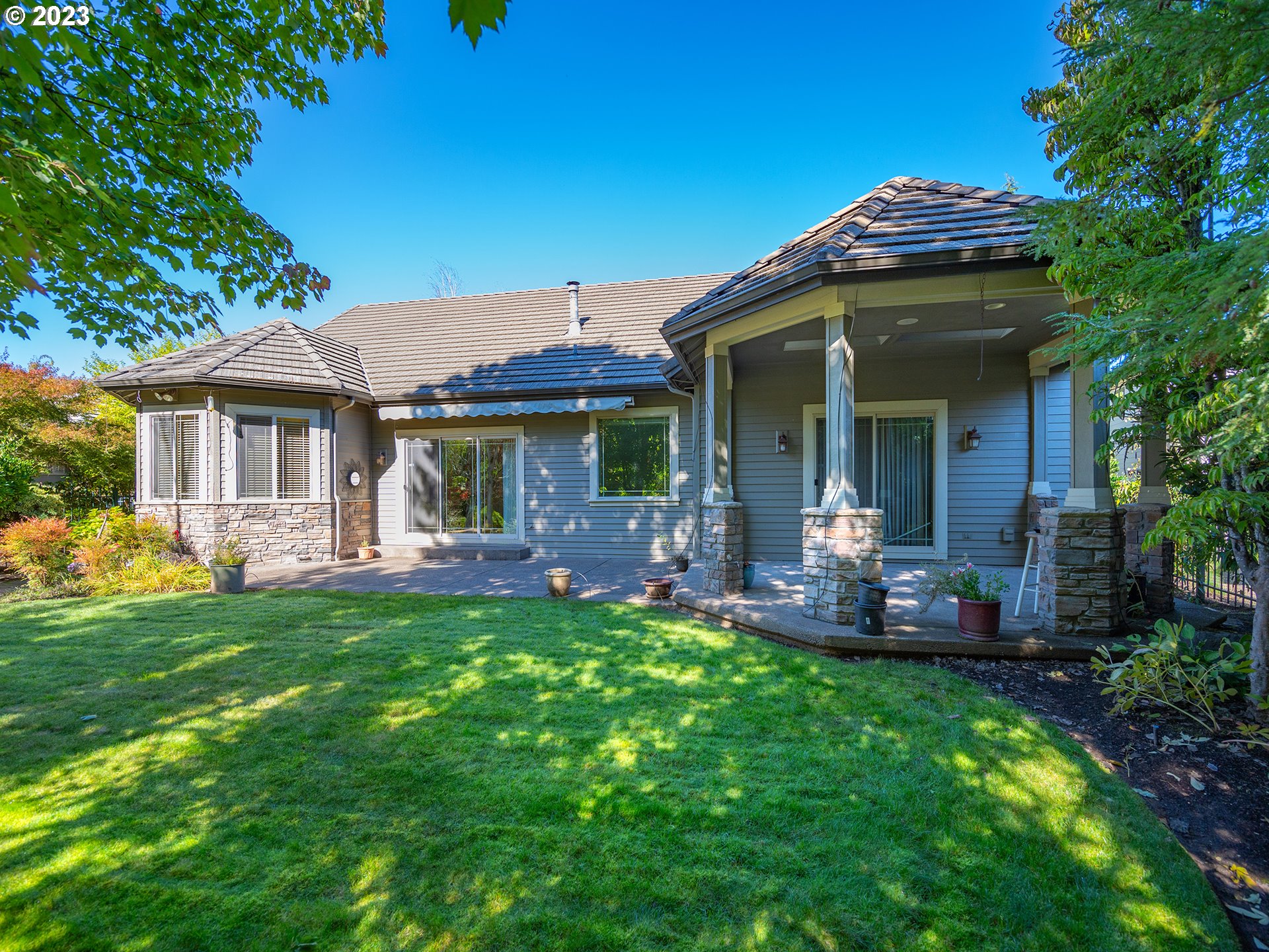 3384 Lakeside Drive Eugene, OR 97401 - Photo 39 of 48 a view of a house with a yard porch and sitting area