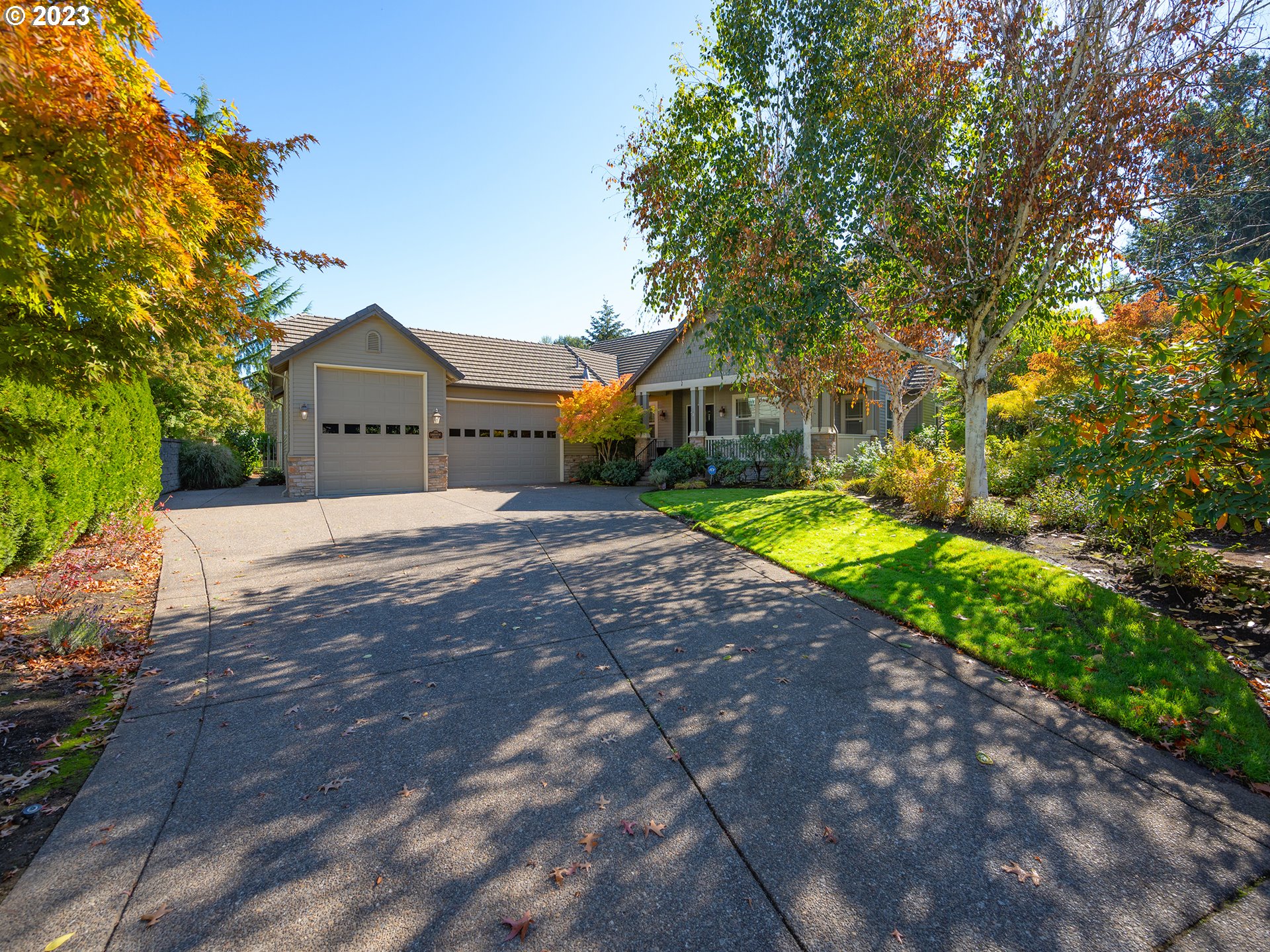 3384 Lakeside Drive Eugene, OR 97401 - Photo 41 of 48 a front view of a house with a yard and large trees