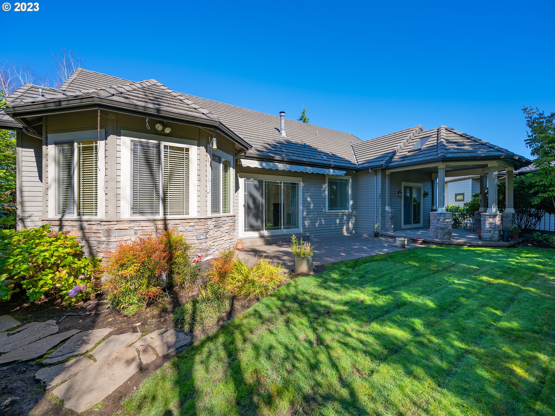 3384 Lakeside Drive Eugene, OR 97401 - Photo 5 of 48 a front view of a house with yard patio and green space