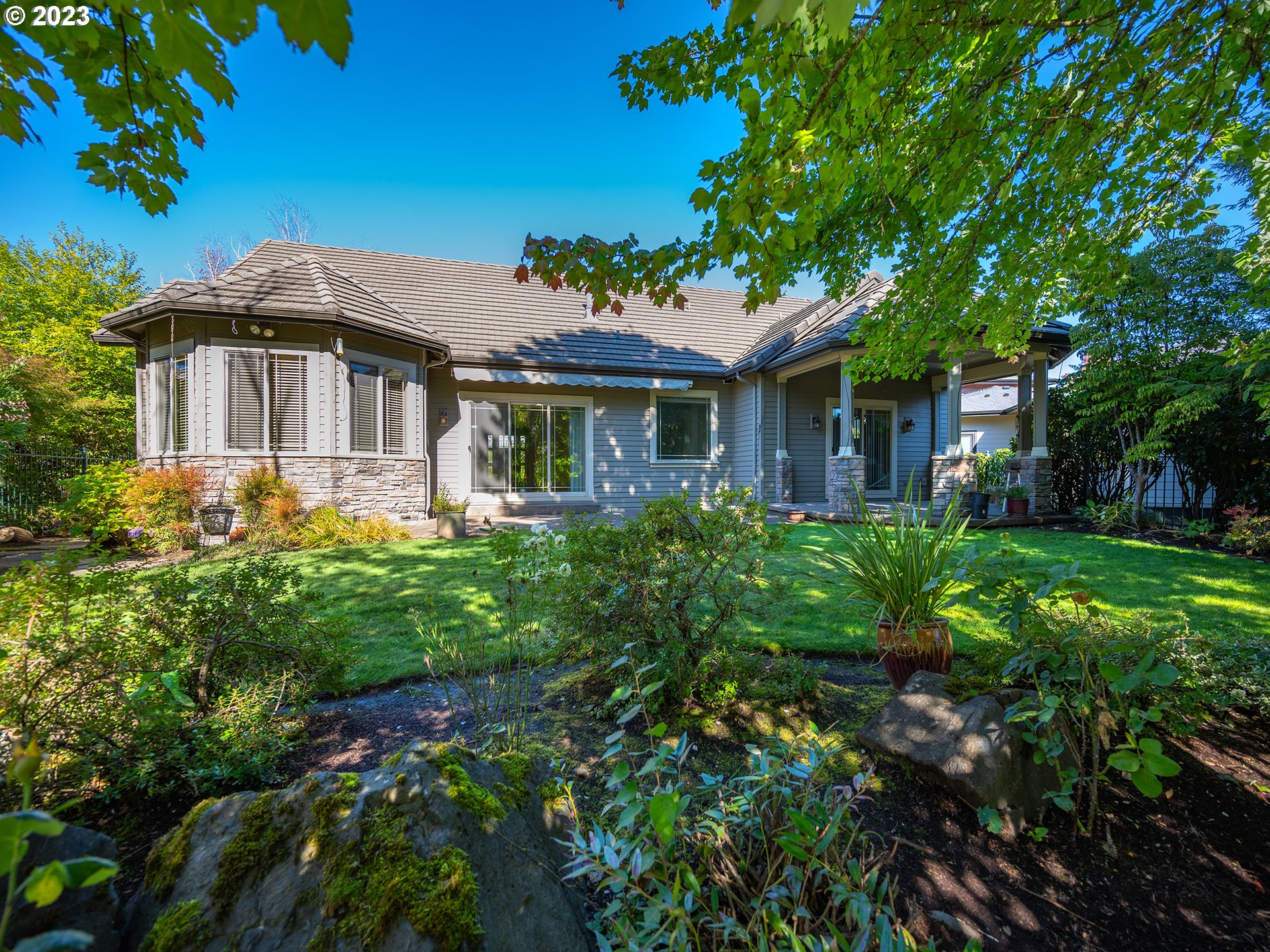 3384 Lakeside Drive Eugene, OR 97401 - Photo 6 of 48 a front view of a house with garden
