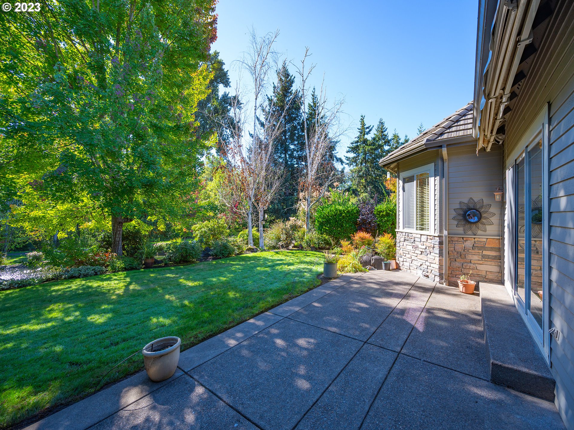 3384 Lakeside Drive Eugene, OR 97401 - Photo 7 of 48 a view of a house with backyard and sitting area