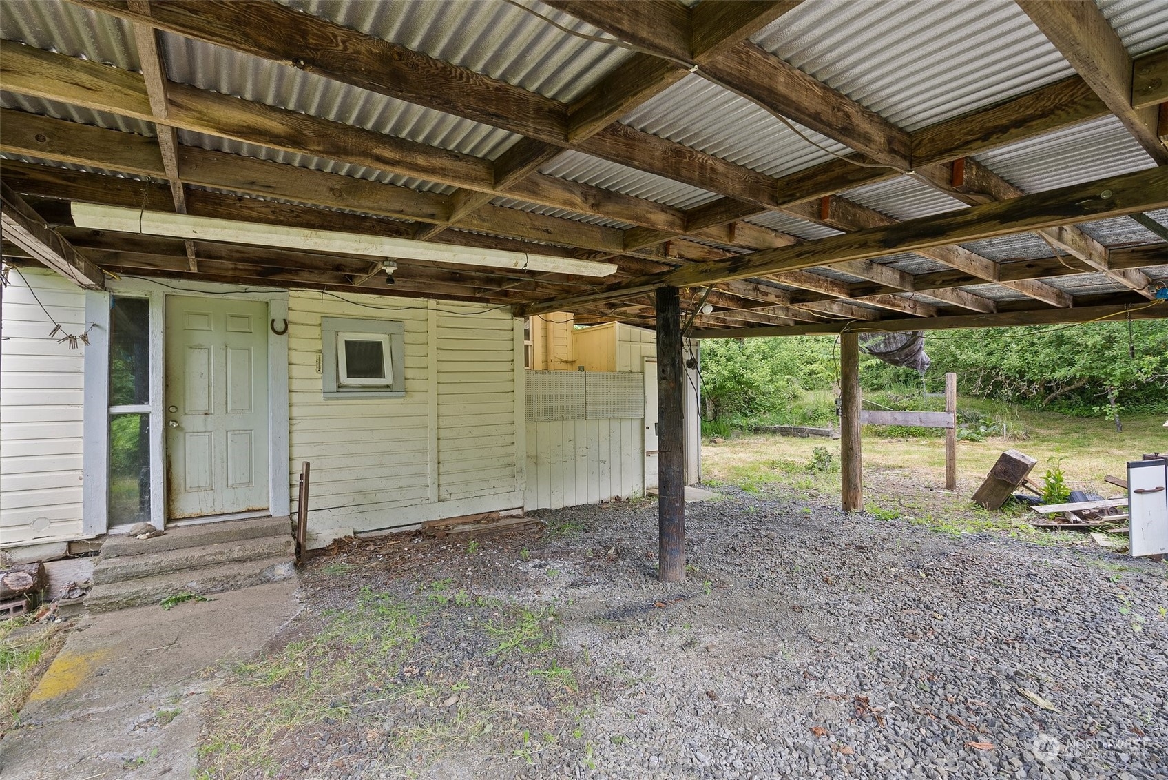 1235 Cedar Street Raymond, WA 98577 - Photo 17 of 23 a view of a backyard