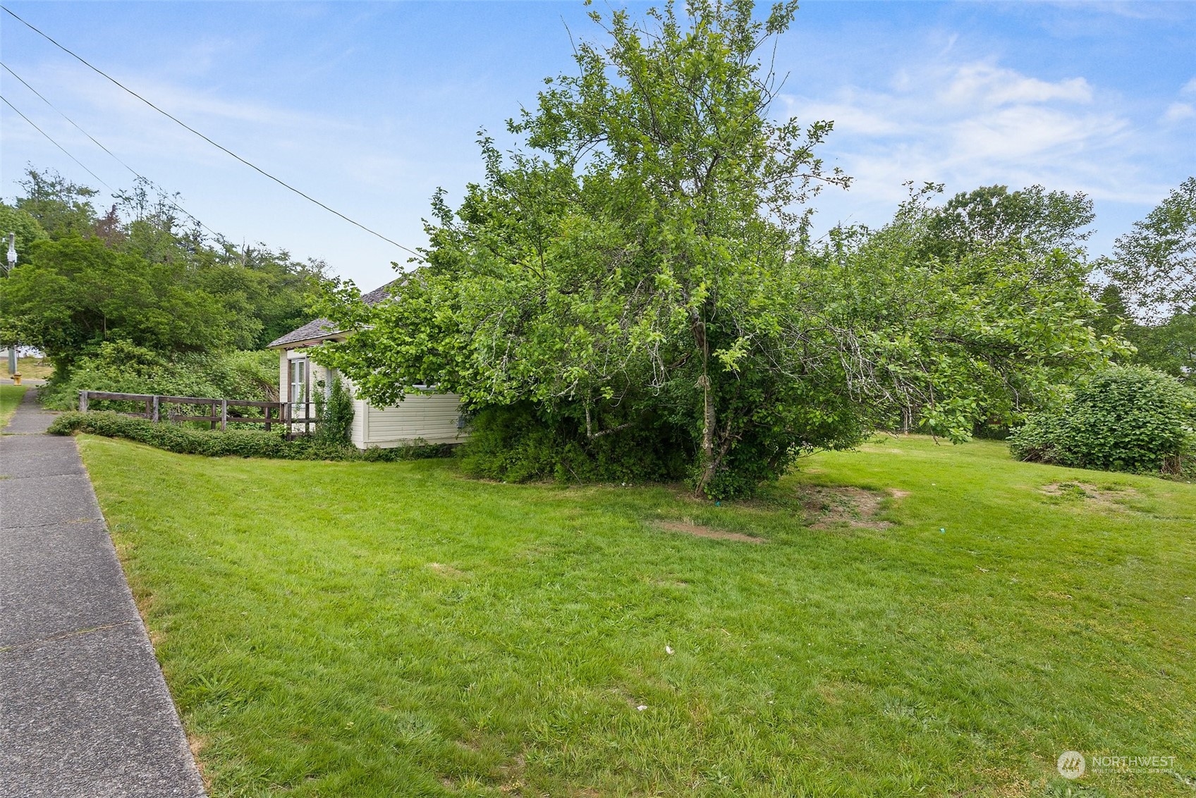 1235 Cedar Street Raymond, WA 98577 - Photo 23 of 23 a view of a house with a yard