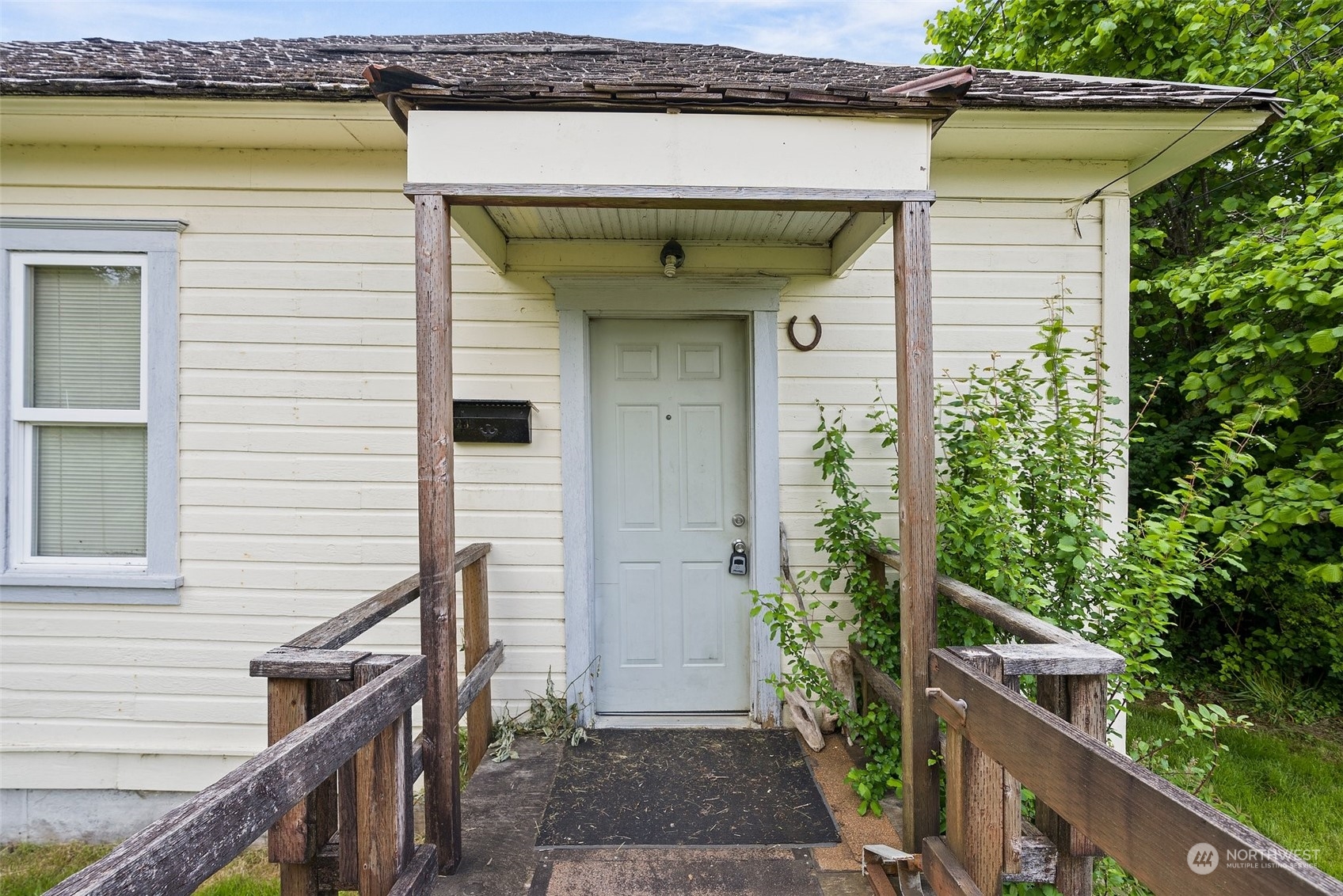 1235 Cedar Street Raymond, WA 98577 - Photo 3 of 23 a view of a entryway door of the house