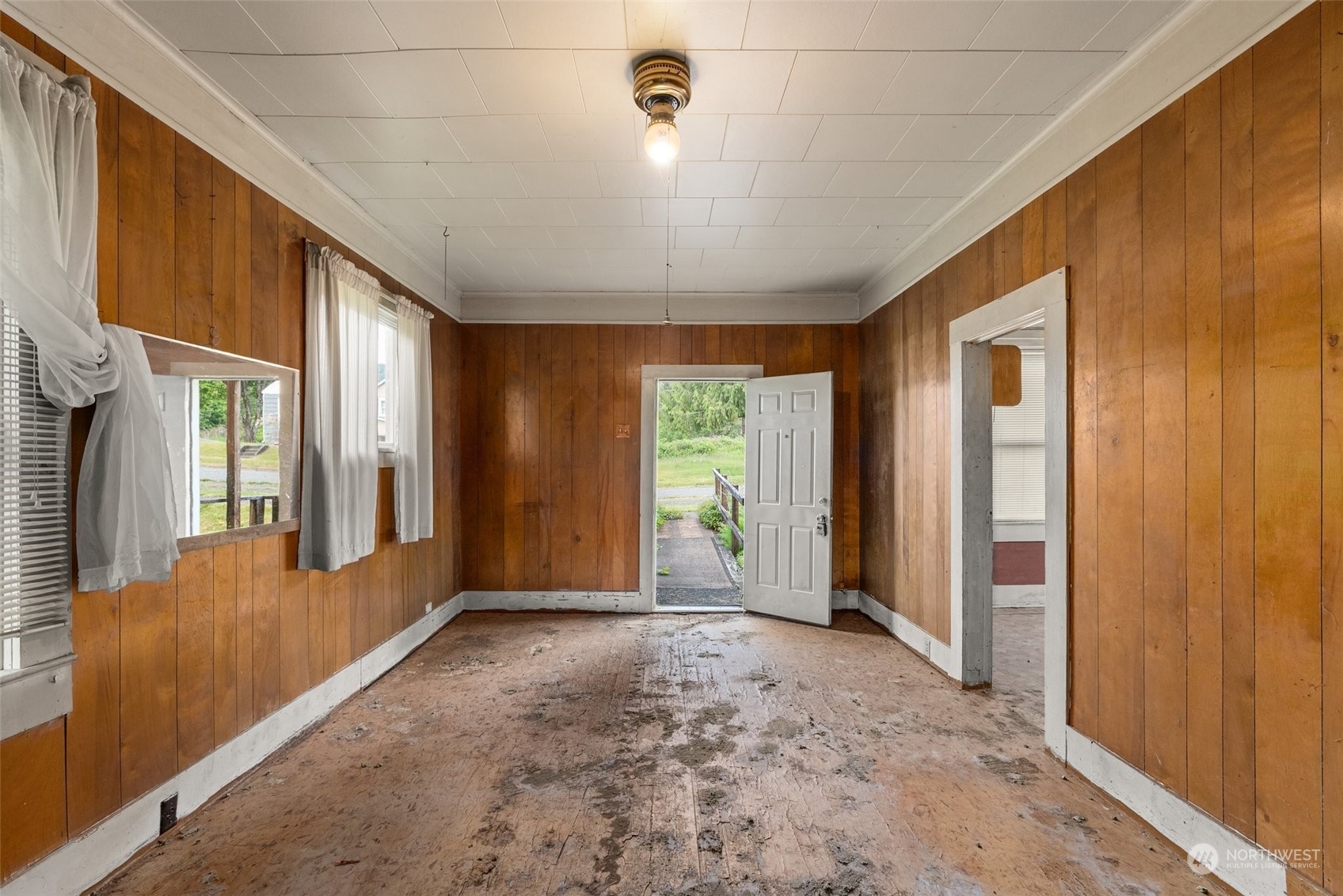 1235 Cedar Street Raymond, WA 98577 - Photo 5 of 23 a view of a hallway with windows