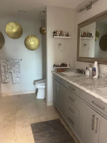 a kitchen with a sink and a stove