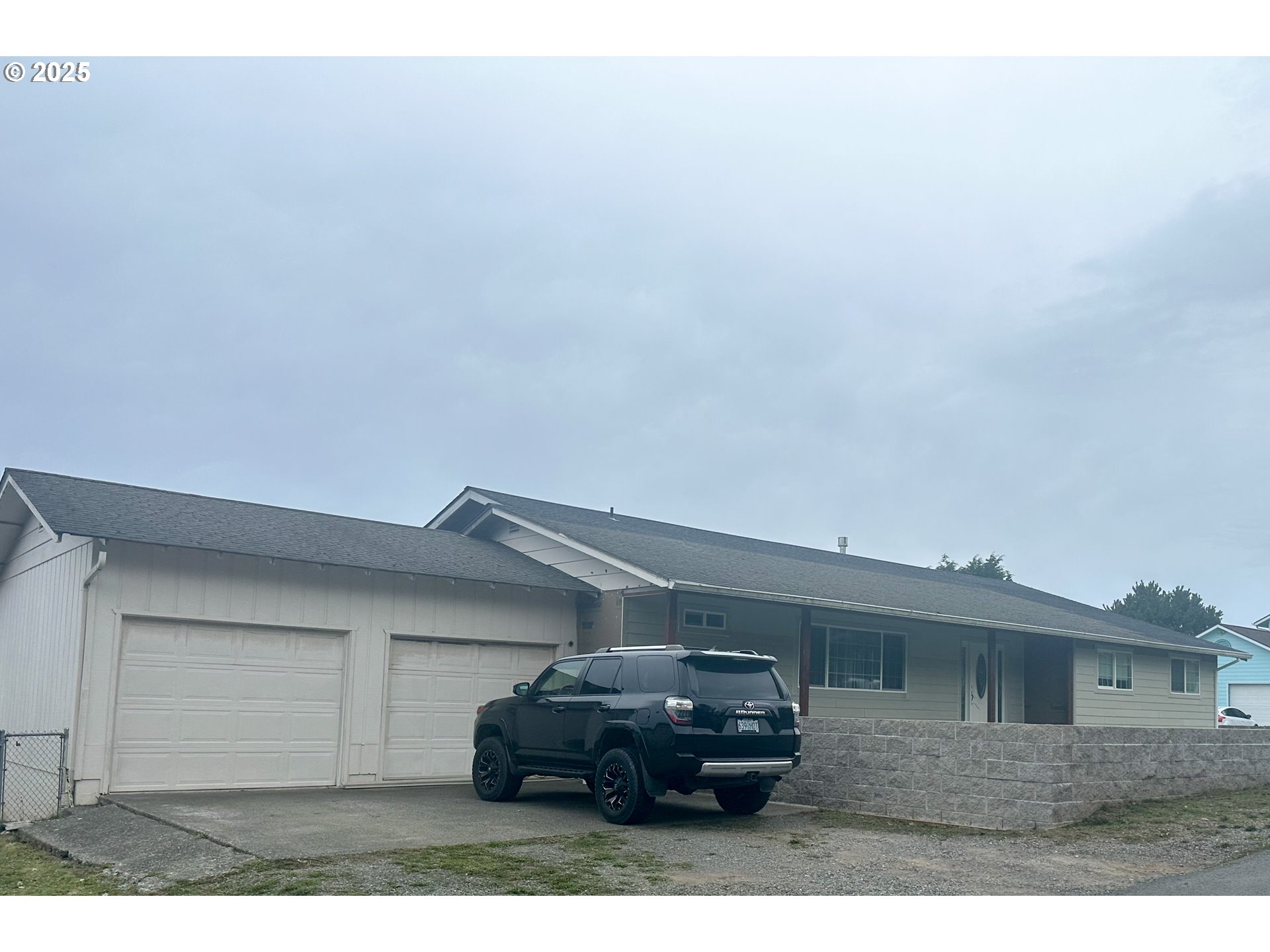 711 1st Street Brookings, OR 97415 - Photo 1 of 21 a black and white photo of a house