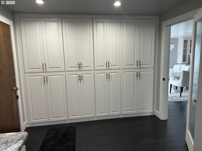 711 1st Street Brookings, OR 97415 - Photo 10 of 21 an empty room with wooden floor