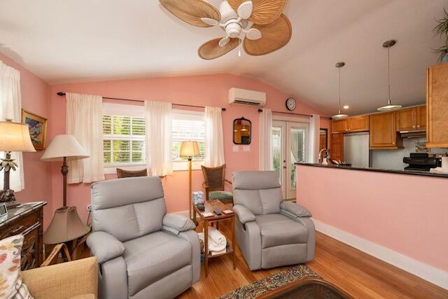 1218 Packer Street, Unit REAR Key West, FL 33040 - Photo 6 of 22 a living room with furniture ceiling fan and a window