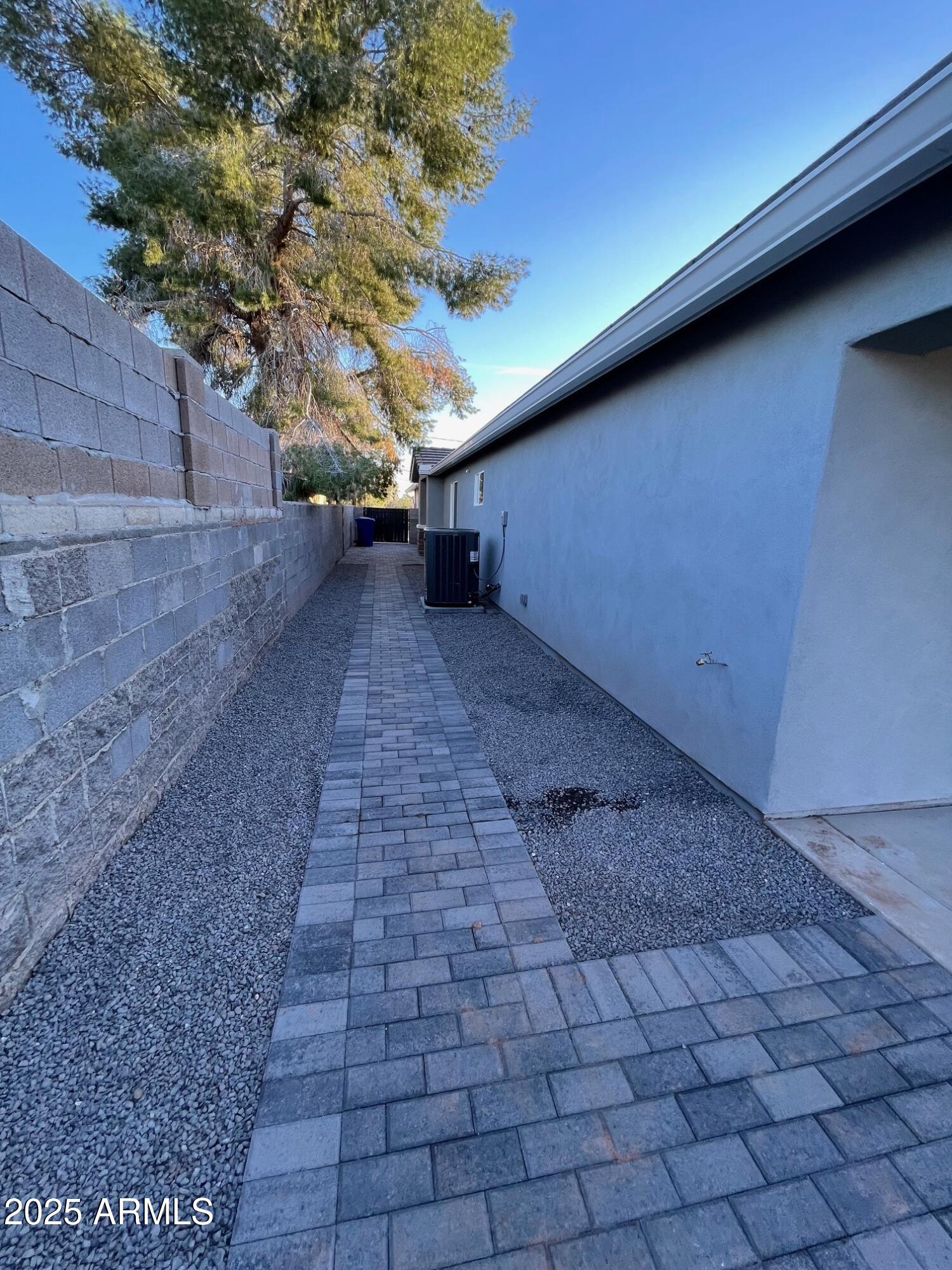 82 West Brooks Street Gilbert, AZ 85233 - Photo 20 of 23 a view of a yard with a tree