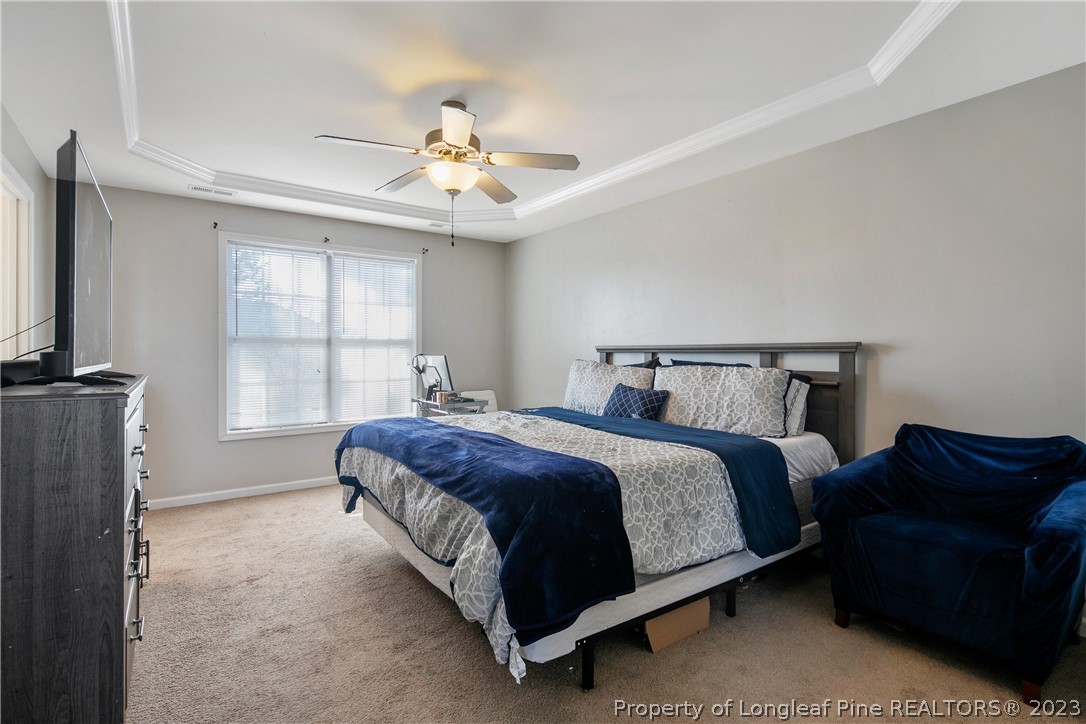 2040 Yellowbrick Road Fayetteville, NC 28314 - Photo 29 of 50 a spacious bedroom with a bed and a window