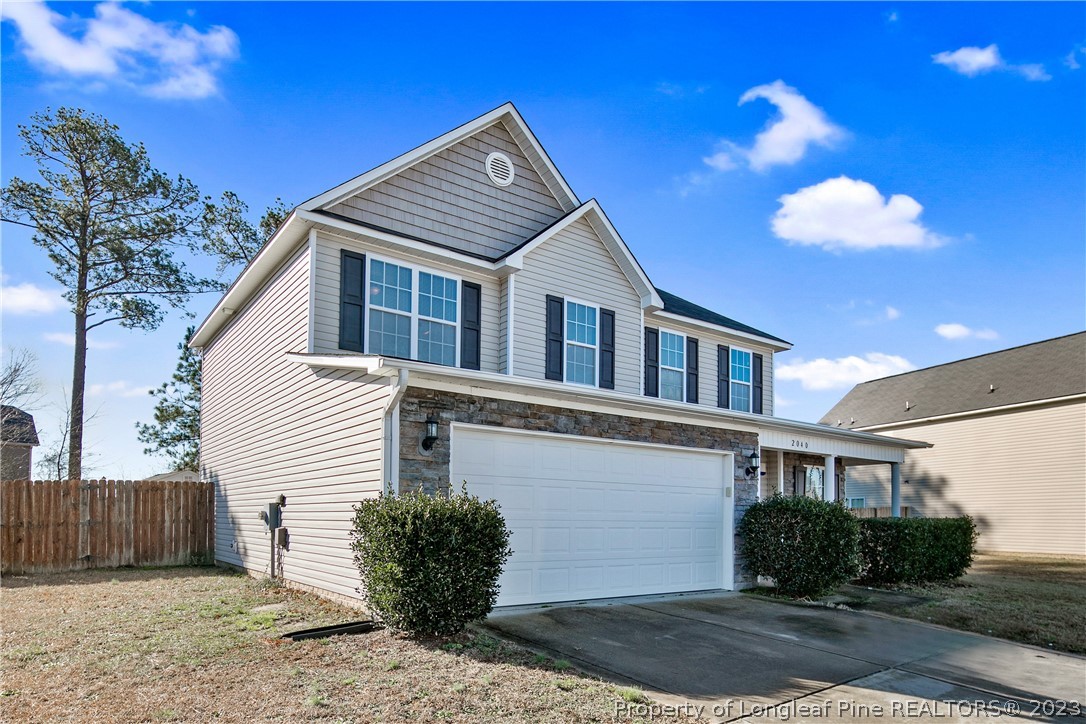 2040 Yellowbrick Road Fayetteville, NC 28314 - Photo 3 of 50 a view of a house with a backyard