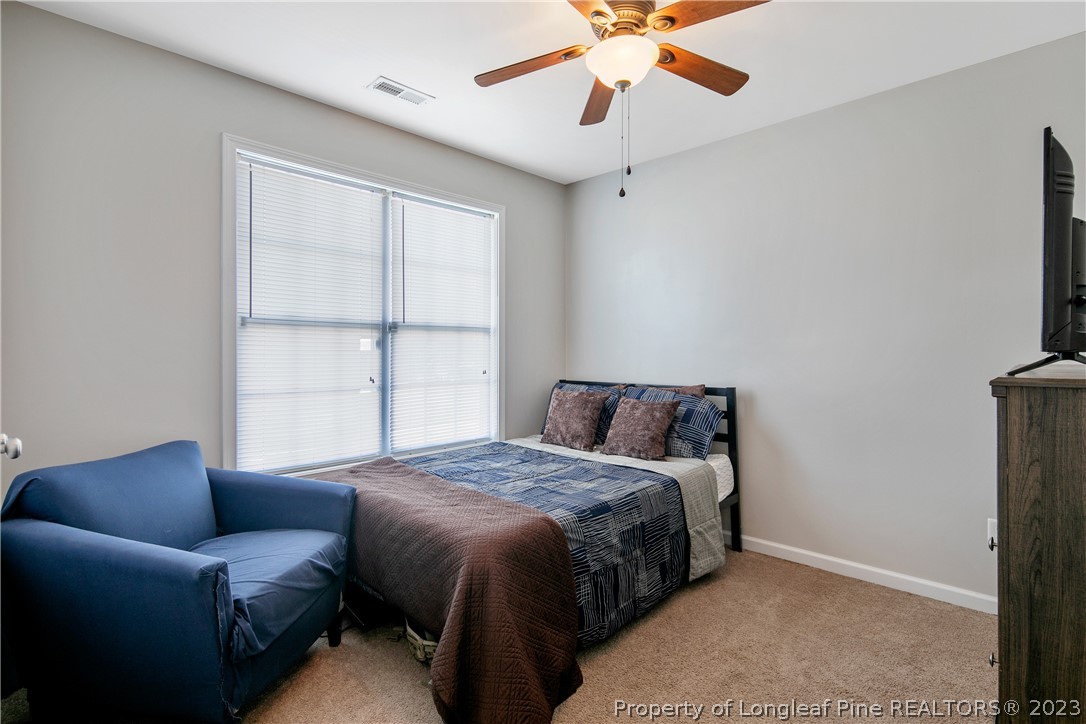 2040 Yellowbrick Road Fayetteville, NC 28314 - Photo 37 of 50 a bed room with a bed and a window
